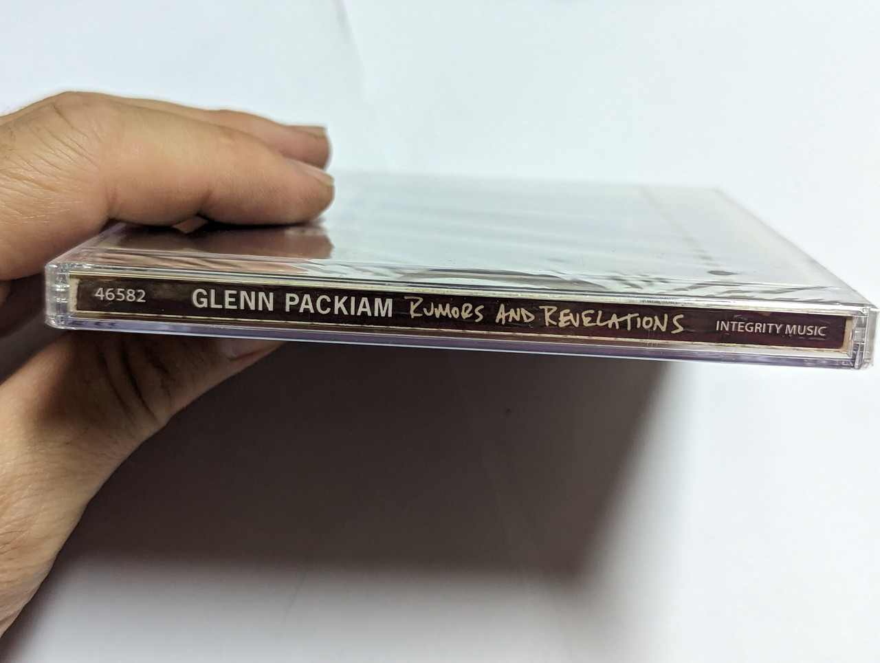 https://cdn10.bigcommerce.com/s-62bdpkt7pb/products/0/images/303679/Glenn_Packiam_Rumors_And_Revelations_Integrity_Music_Audio_CD_2009_46582_3__99739.1697119147.1280.1280.jpg?c=2&_gl=1*li8t24*_ga*MjA2NTIxMjE2MC4xNTkwNTEyNTMy*_ga_WS2VZYPC6G*MTY5NzExODQwOS4xMTAwLjEuMTY5NzExODk2Ny40Ny4wLjA.