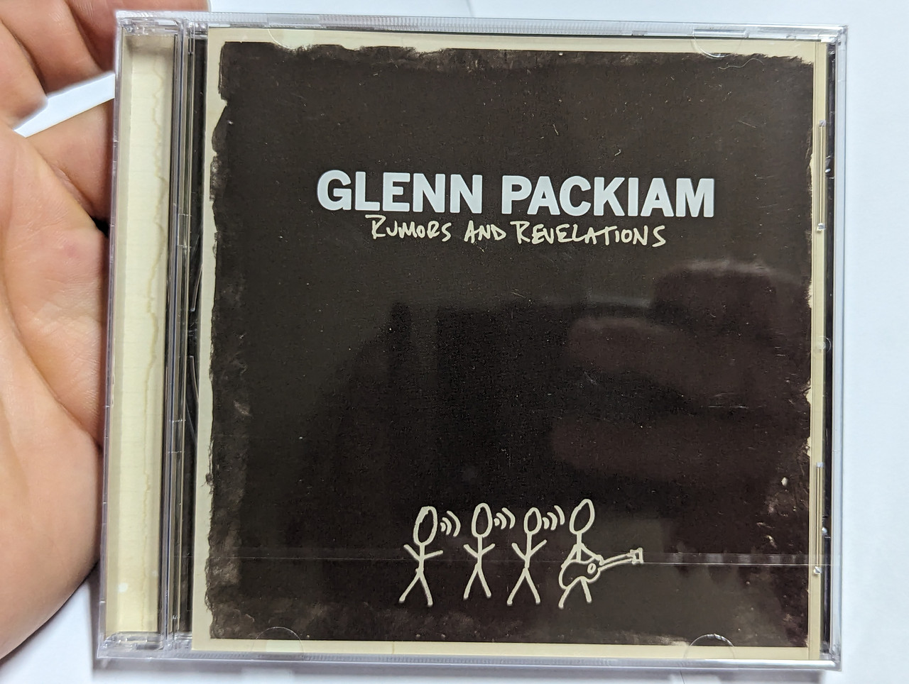 https://cdn10.bigcommerce.com/s-62bdpkt7pb/products/0/images/303680/Glenn_Packiam_Rumors_And_Revelations_Integrity_Music_Audio_CD_2009_46582_1__52041.1697119154.1280.1280.jpg?c=2&_gl=1*li8t24*_ga*MjA2NTIxMjE2MC4xNTkwNTEyNTMy*_ga_WS2VZYPC6G*MTY5NzExODQwOS4xMTAwLjEuMTY5NzExODk2Ny40Ny4wLjA.