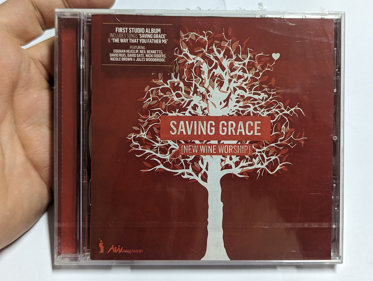 https://cdn10.bigcommerce.com/s-62bdpkt7pb/products/0/images/303902/New_Wine_Worship_Saving_Grace_First_Studio_Album_Includes_Songs_Saving_Grace_The_Way_That_You_Father_Me._Featuring_Eoghan_Heaslip_Neil_Bennetts_David_Ruis_David_Gate_Nicki_Rogers_1__77218.1697435477.1280.1280.jpg?c=2&_gl=1*rr3yyp*_ga*MjA2NTIxMjE2MC4xNTkwNTEyNTMy*_ga_WS2VZYPC6G*MTY5NzQzMDkyOS4xMTA0LjEuMTY5NzQzNTIyMS42MC4wLjA.