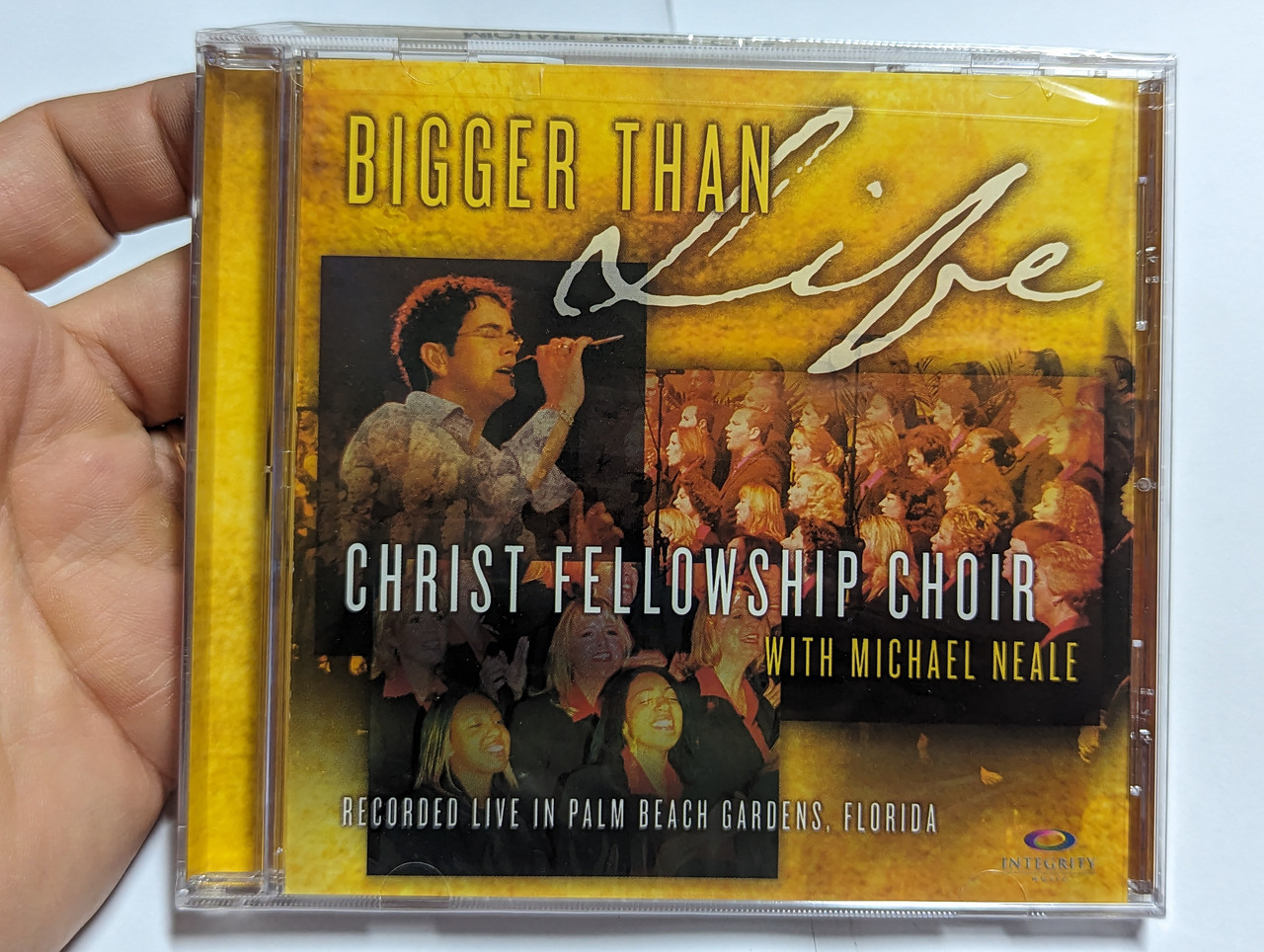 https://cdn10.bigcommerce.com/s-62bdpkt7pb/products/0/images/303962/Bigger_Than_Life_-_Christ_Fellowship_Choir_With_Michael_Neale_Recorded_Live_In_Palm_Beach_Gardens_Florida_Integrity_Music_Audio_CD_2005_33502_1__63257.1697445299.1280.1280.jpg?c=2&_gl=1*1g8sy4b*_ga*MjA2NTIxMjE2MC4xNTkwNTEyNTMy*_ga_WS2VZYPC6G*MTY5NzQzMDkyOS4xMTA0LjEuMTY5NzQ0NDkzNi41MS4wLjA.