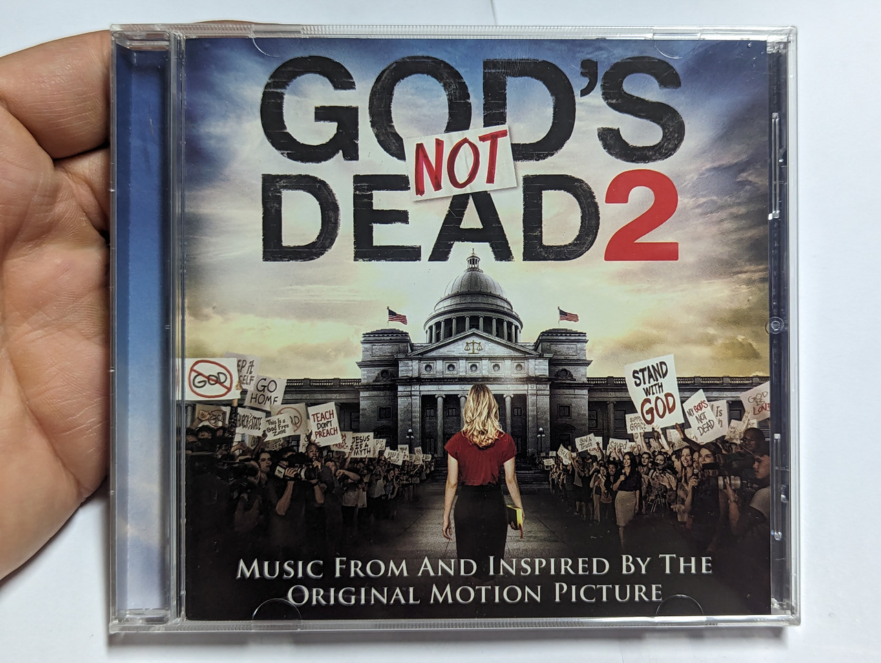 https://cdn10.bigcommerce.com/s-62bdpkt7pb/products/0/images/304071/Gods_Not_Dead_2_Music_From_And_Inspired_By_The_Original_Motion_Picture_Fair_Trade_Services_Audio_CD_2016_696859309984_1__14675.1697516261.1280.1280.jpg?c=2&_gl=1*1gmwjo9*_ga*MjA2NTIxMjE2MC4xNTkwNTEyNTMy*_ga_WS2VZYPC6G*MTY5NzQzMDkyOS4xMTA0LjEuMTY5NzQ0NTUzOC41MS4wLjA.