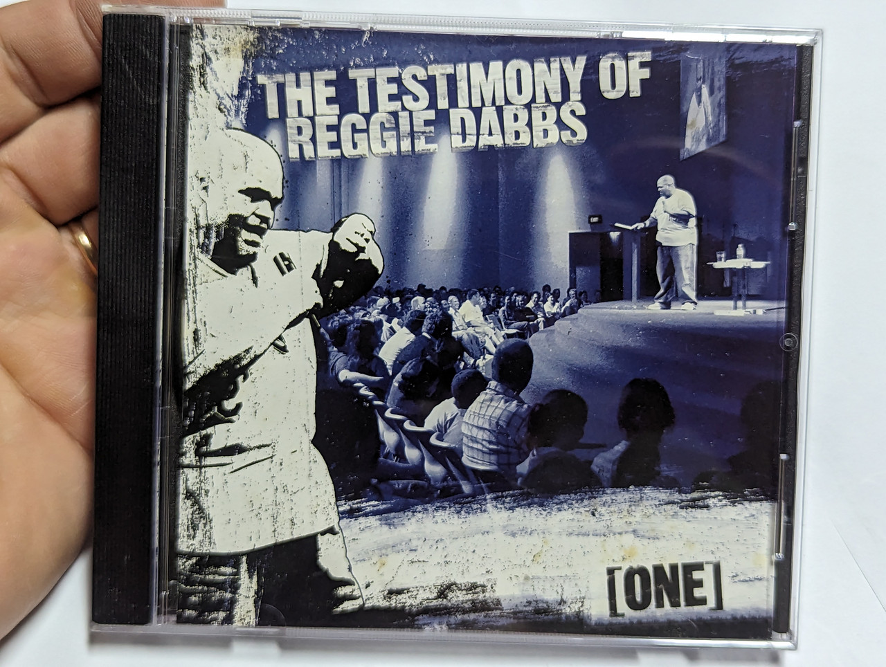 https://cdn10.bigcommerce.com/s-62bdpkt7pb/products/0/images/304204/The_Testimony_Of_Reggie_Dabbs_One_WORD_Australia_Audio_CD_2004_1__27019.1697553054.1280.1280.jpg?c=2&_gl=1*1nphpvp*_ga*MjA2NTIxMjE2MC4xNTkwNTEyNTMy*_ga_WS2VZYPC6G*MTY5NzU1MjI0OC4xMTA2LjEuMTY5NzU1MzA1NS42MC4wLjA.