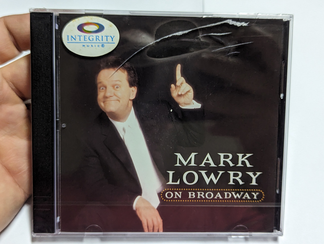 https://cdn10.bigcommerce.com/s-62bdpkt7pb/products/0/images/304218/Mark_Lowry_On_Broadway_Spring_House_Music_Group_Audio_CD_2001_6_1788_42270_2_9_1__45465.1697554880.1280.1280.jpg?c=2&_gl=1*4u8msa*_ga*MjA2NTIxMjE2MC4xNTkwNTEyNTMy*_ga_WS2VZYPC6G*MTY5NzU1MjI0OC4xMTA2LjEuMTY5NzU1NDc4My4zLjAuMA..
