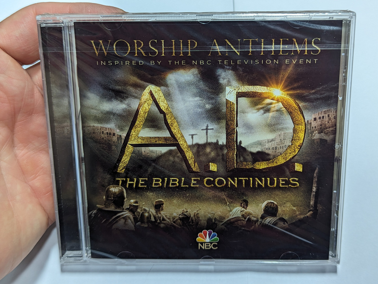 https://cdn10.bigcommerce.com/s-62bdpkt7pb/products/0/images/304471/A._D._The_Bible_Continues_-_Worship_Anthems_Inspired_By_The_NBC_Television_Event_Integrity_Music_Audio_CD_2015_64332_1__12511.1697697242.1280.1280.jpg?c=2&_gl=1*yct7lj*_ga*MjA2NTIxMjE2MC4xNTkwNTEyNTMy*_ga_WS2VZYPC6G*MTY5NzY5MDU3OC4xMTA5LjEuMTY5NzY5NzA2NC40OS4wLjA.