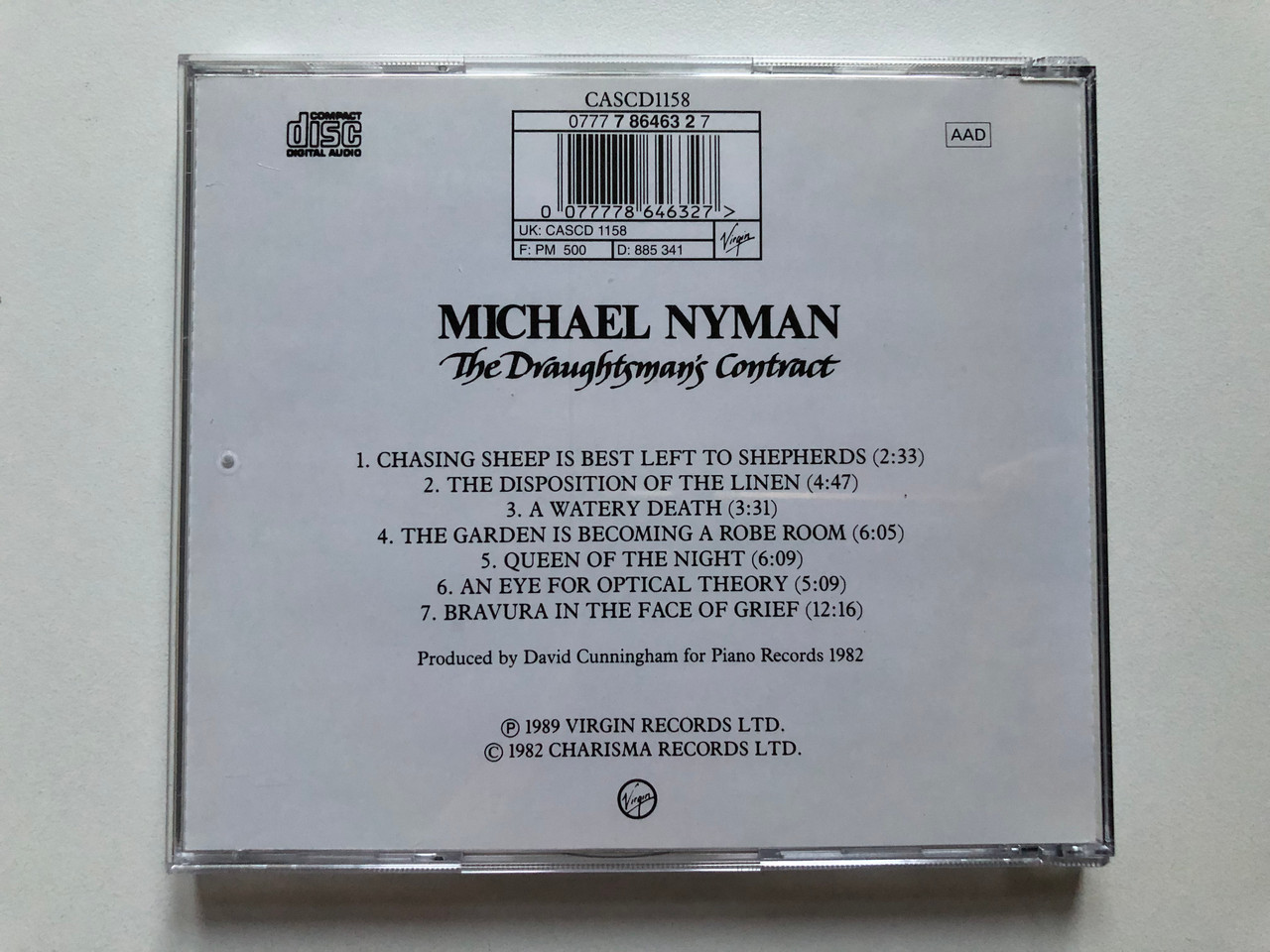 https://cdn10.bigcommerce.com/s-62bdpkt7pb/products/0/images/305019/Michael_Nyman_The_Draughtsmans_Contract_Virgin_Audio_CD_1989_0777_7_86463_2_7_2__14326.1697785326.1280.1280.JPG?c=2&_gl=1*94bqvx*_ga*MjA2NTIxMjE2MC4xNTkwNTEyNTMy*_ga_WS2VZYPC6G*MTY5Nzc3ODUwNi4xMTEwLjEuMTY5Nzc4NTIzNi42MC4wLjA.