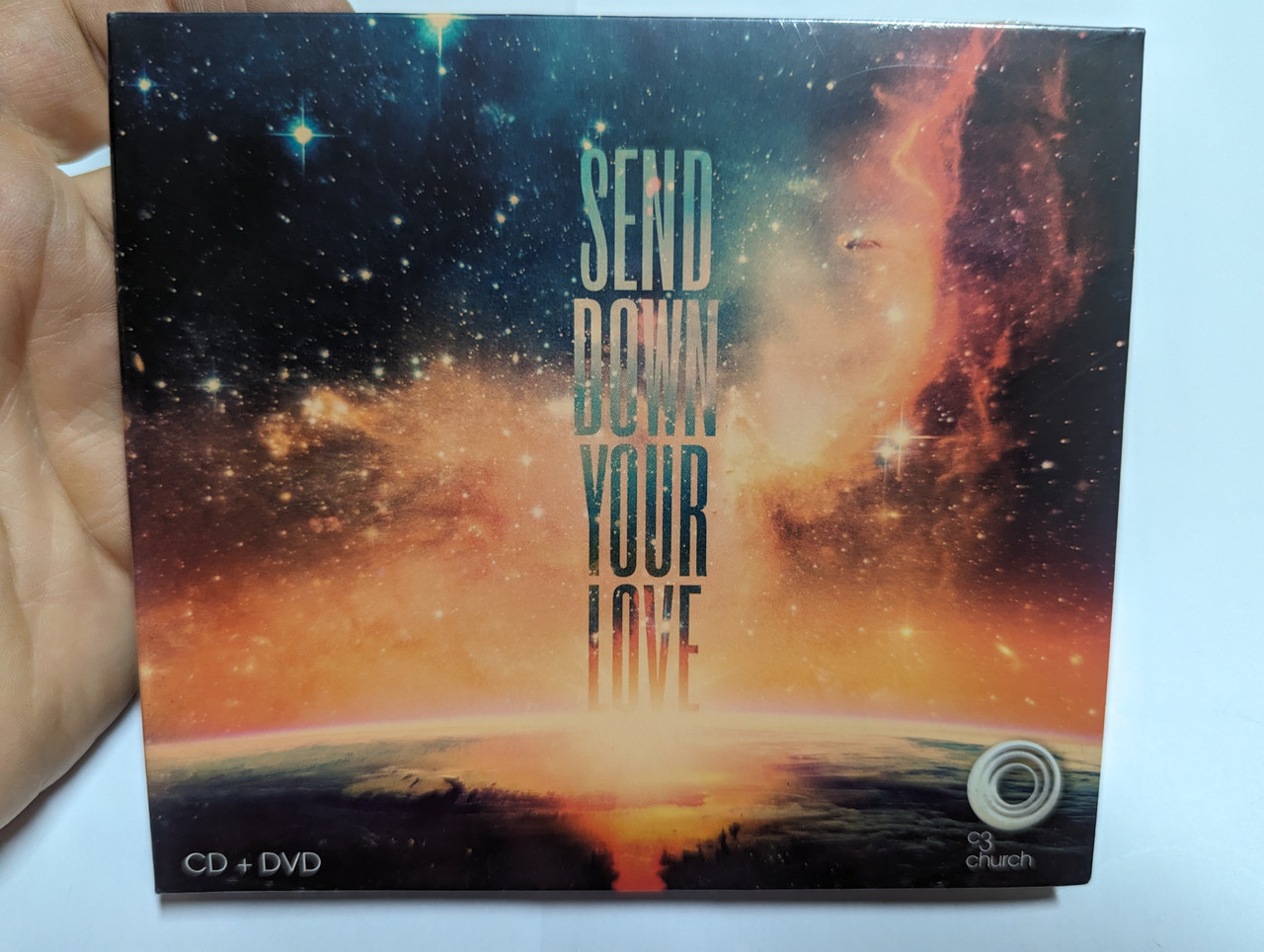 https://cdn10.bigcommerce.com/s-62bdpkt7pb/products/0/images/305034/Send_Down_Your_Love_C3_Music_Audio_CD_DVD_2010_SGCD047_1__89296.1697786070.1280.1280.jpg?c=2&_gl=1*dvq696*_ga*MjA2NTIxMjE2MC4xNTkwNTEyNTMy*_ga_WS2VZYPC6G*MTY5Nzc3ODUwNi4xMTEwLjEuMTY5Nzc4NjA3Ni42MC4wLjA.