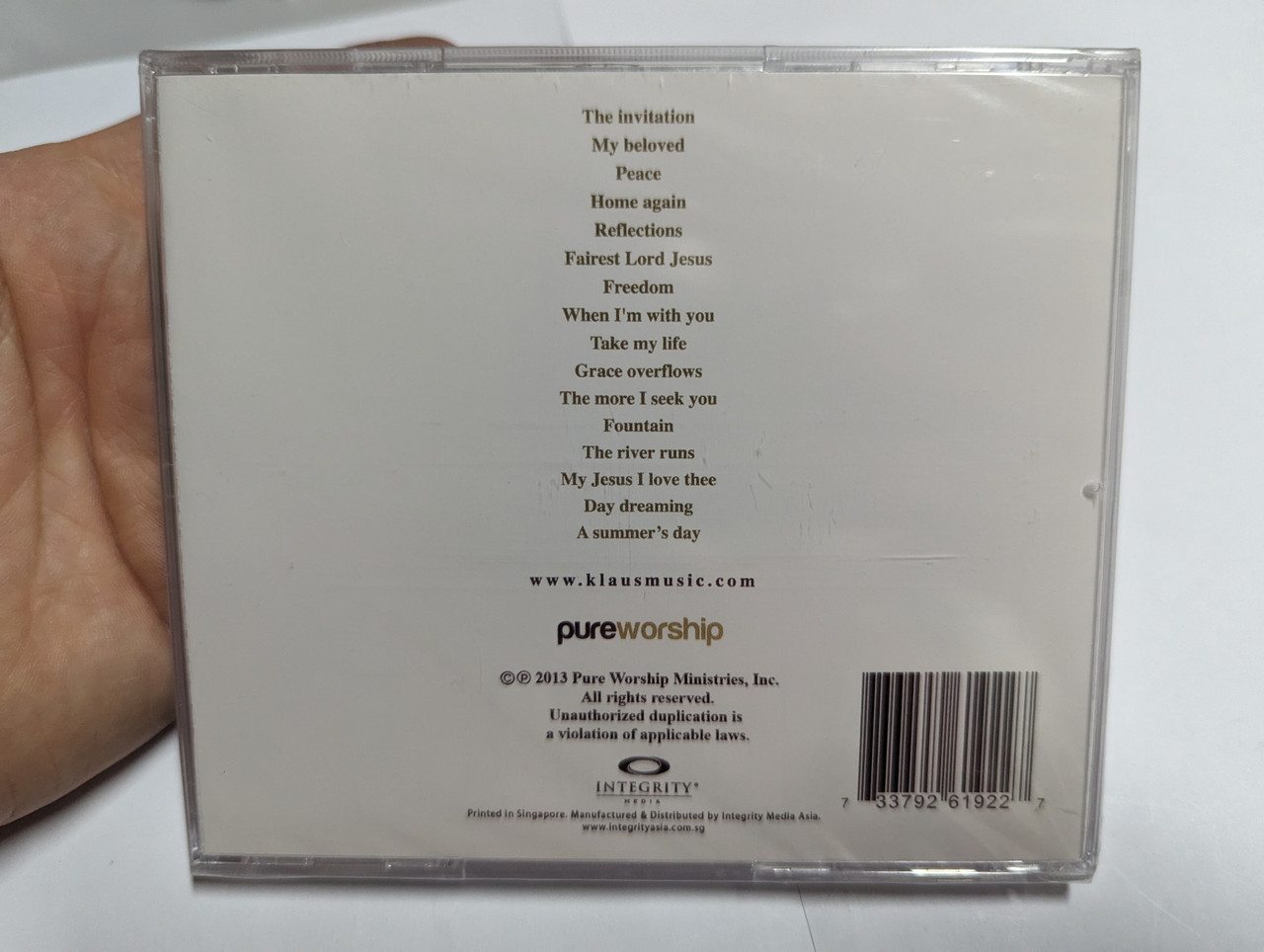 https://cdn10.bigcommerce.com/s-62bdpkt7pb/products/0/images/305096/The_Invitation_To_The_Quiet_Place_-_Piano_Solos_By_Klaus_Pure_Worship_Audio_CD_2013_2__10933.1697789779.1280.1280.jpg?c=2&_gl=1*1tkfhpb*_ga*MjA2NTIxMjE2MC4xNTkwNTEyNTMy*_ga_WS2VZYPC6G*MTY5Nzc3ODUwNi4xMTEwLjEuMTY5Nzc4OTU3Mi41OC4wLjA.