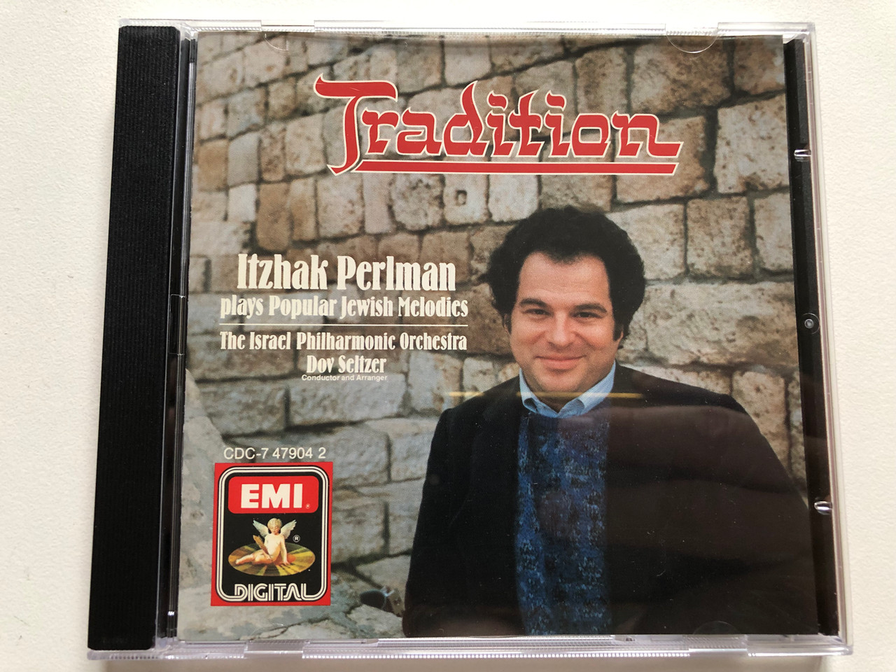 https://cdn10.bigcommerce.com/s-62bdpkt7pb/products/0/images/306131/Tradition_-_Itzhak_Perlman_Plays_Popular_Jewish_Melodies_-_The_Israel_Philharmonic_Orchestra_Dov_Seltzer_conductor_and_arranger_EMI_Digital_Audio_CD_1987_CDC-7_47904_2_1__58487.1698158523.1280.1280.JPG?c=2