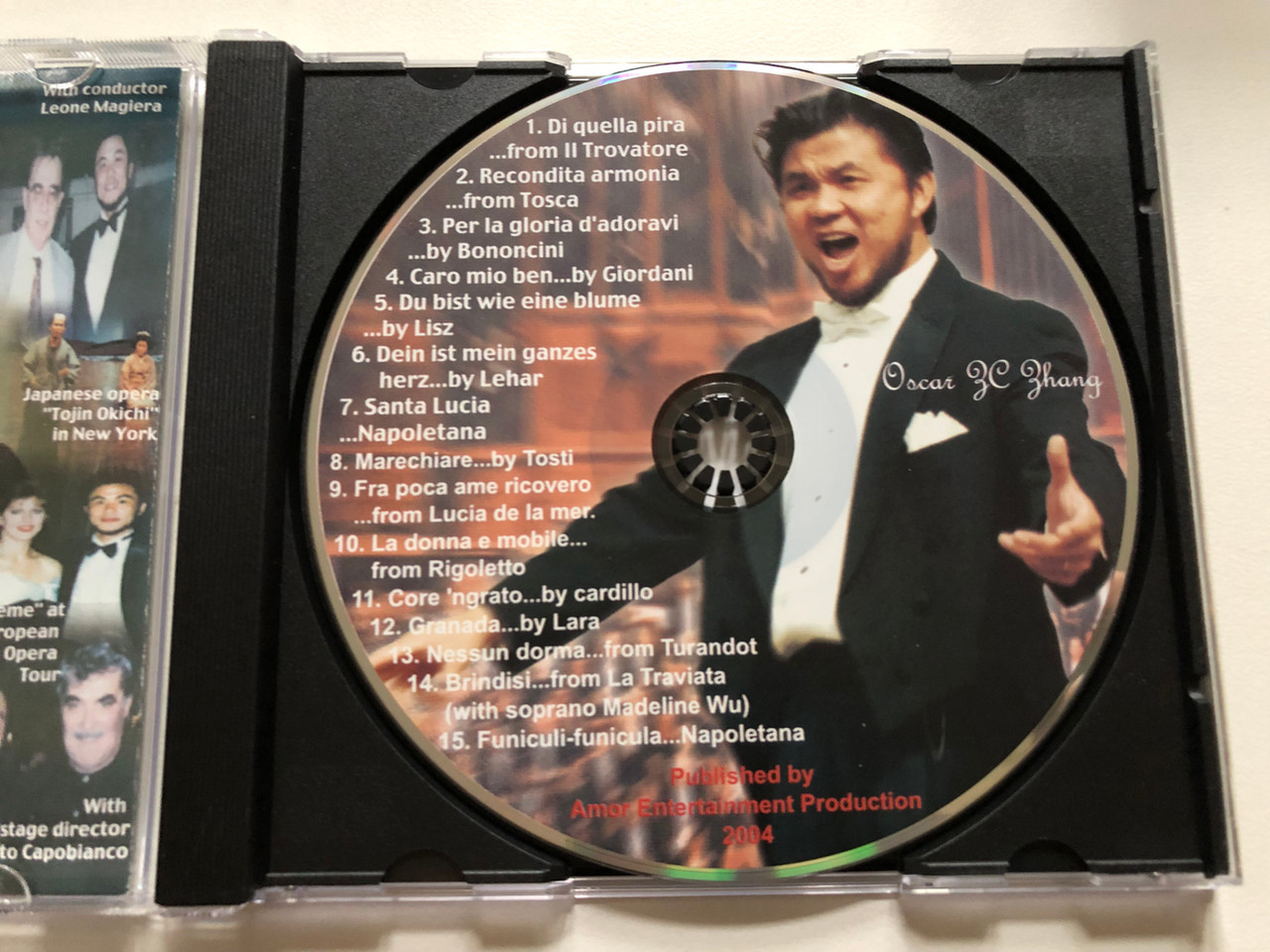 https://cdn10.bigcommerce.com/s-62bdpkt7pb/products/0/images/306365/The_Spirit_-_Oscar_ZC._Zhang_The_Worlds_Favourite_Tenor_Songs_Live_recordings_from_concert_halls_worldwide_Amor_Entertainment_Production_Audio_CD_2004_3__51202.1698241297.1280.1280.JPG?c=2