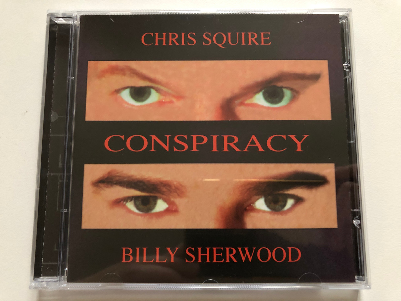 https://cdn10.bigcommerce.com/s-62bdpkt7pb/products/0/images/306412/Chris_Squire_Billy_Sherwood_Conspiracy_Eagle_Records_Audio_CD_2000_EAGCD126_1__80456.1698249589.1280.1280.JPG?c=2