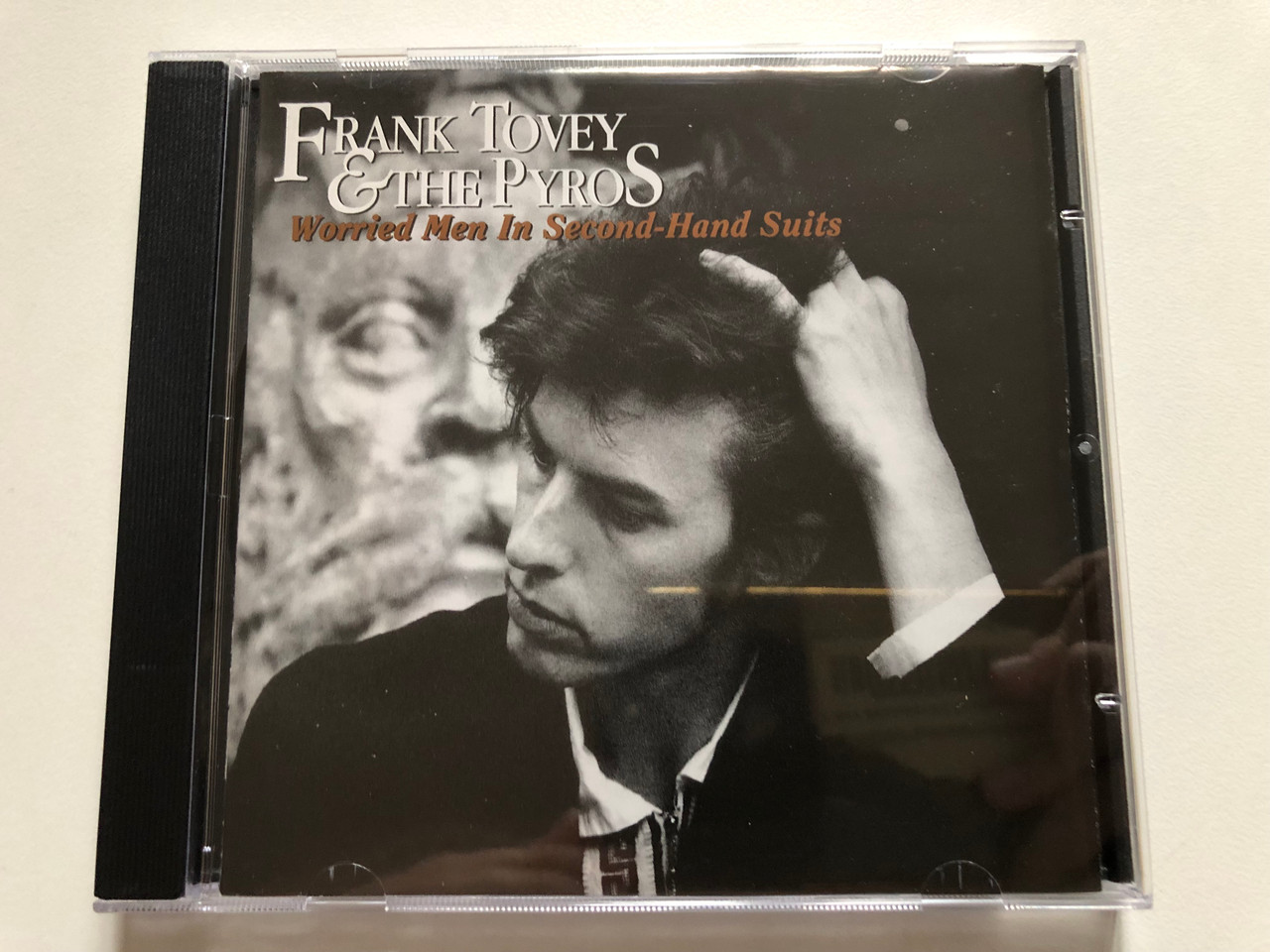 https://cdn10.bigcommerce.com/s-62bdpkt7pb/products/0/images/306446/Frank_Tovey_The_Pyros_Worried_Men_In_Second-Hand_Suits_Mute_Audio_CD_1992_CDStumm_107_1__84202.1698251314.1280.1280.JPG?c=2