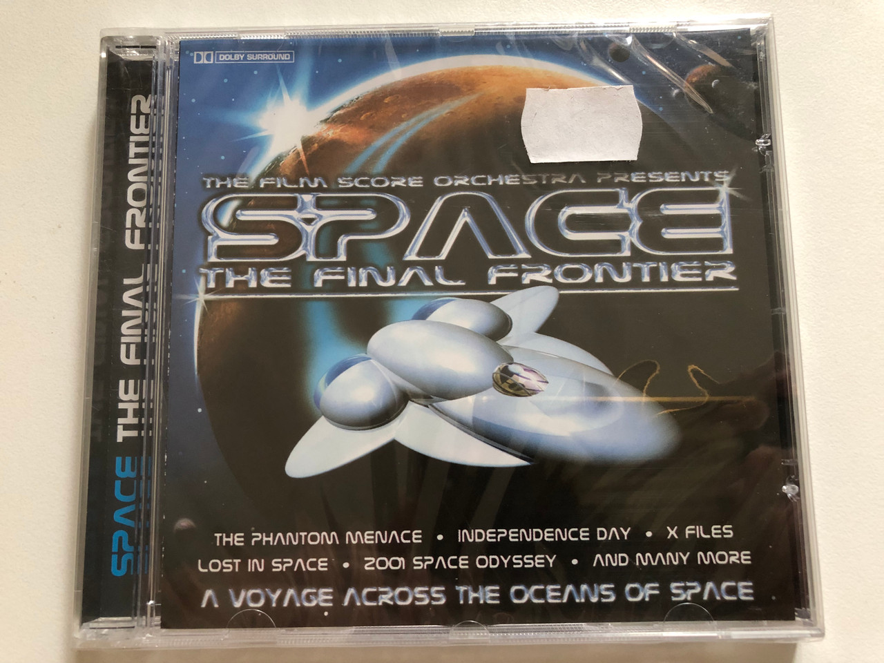 https://cdn10.bigcommerce.com/s-62bdpkt7pb/products/0/images/306568/The_Film_Score_Orchestra_Presents_Space_The_Final_Frontier_-_The_Phantom_Menace_Independence_Day_X_Files_Lost_In_Space_2001_Space_Odyssey_and_many_more_Cedar_Audio_CD_1-1067_1__39483.1698309066.1280.1280.JPG?c=2