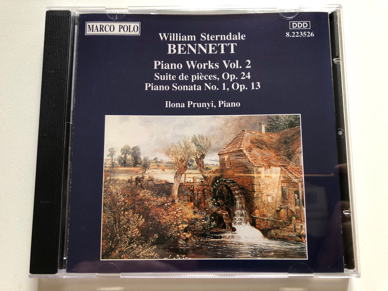 https://cdn10.bigcommerce.com/s-62bdpkt7pb/products/0/images/307015/William_Sterndale_Bennett_-_Piano_Works_Vol._2_Suite_De_Pices_Op._24_Piano_Sonata_No._1_Op._13_-_Ilona_Prunyi_piano_Marco_Polo_Audio_CD_1993_Stereo_8_1__63055.1698439083.1280.1280.JPG?c=2