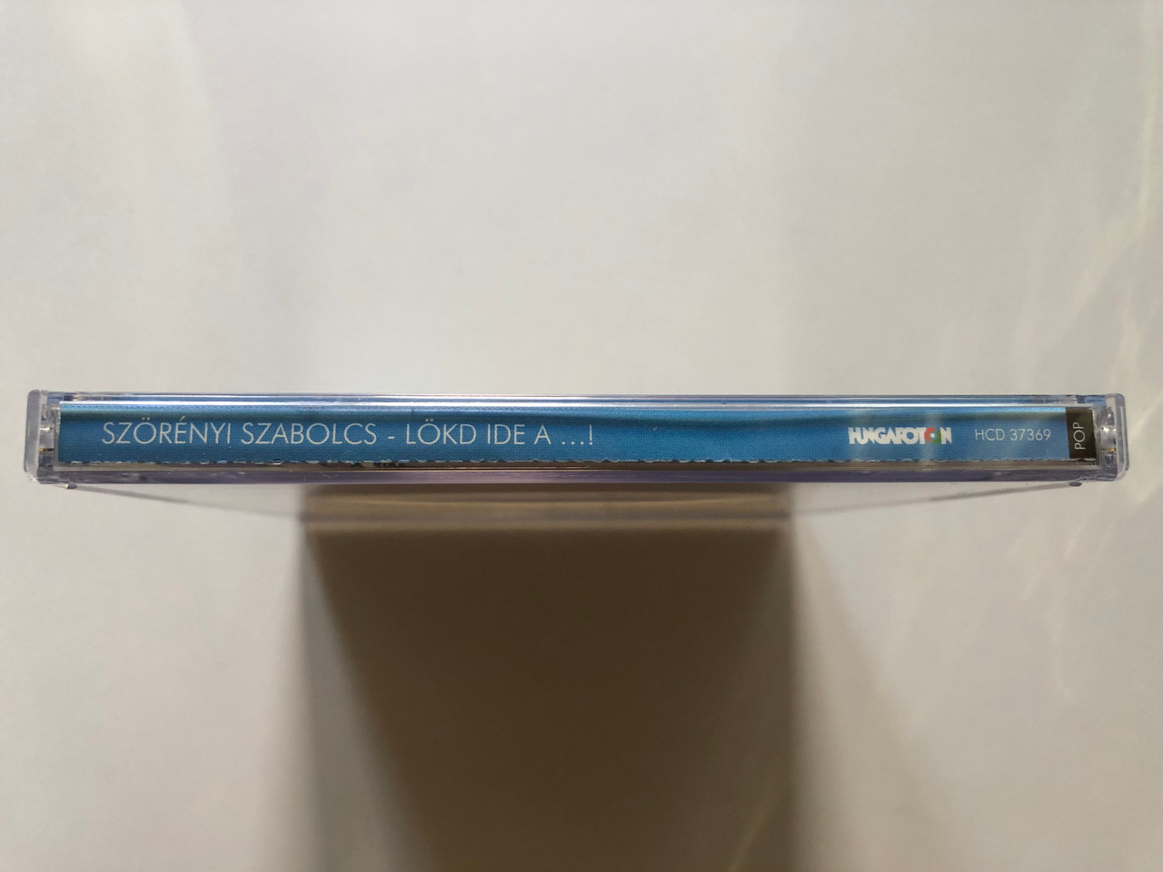 https://cdn10.bigcommerce.com/s-62bdpkt7pb/products/0/images/307404/Szrnyi_Szabolcs_Lkd_Ide_A_..._Kocsmadalok_Hungaroton_Audio_CD_2003_HCD_37369_3__33168.1698653539.1280.1280.JPG?c=2