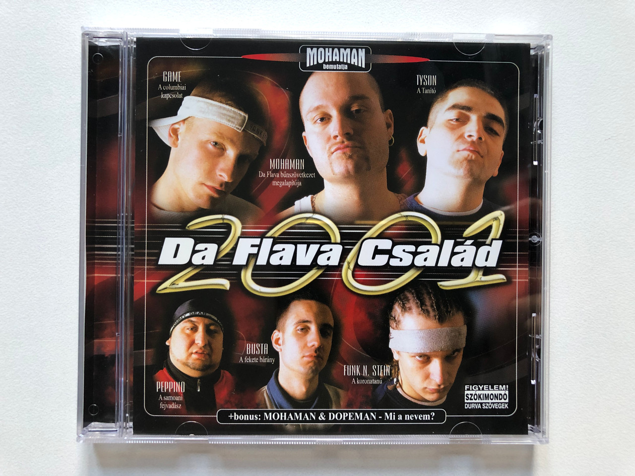 https://cdn10.bigcommerce.com/s-62bdpkt7pb/products/0/images/307424/Mohaman_Da_Flava_Csald_2001_Game_Mohaman_Tyson_Peppino_Busta_Funk_N._Stein_bonus_Mohaman_Dopeman_-_Mi_e_nevem_Hungaroton_Audio_CD_2001_HCD_71068-2_1__55771.1698658084.1280.1280.JPG?c=2