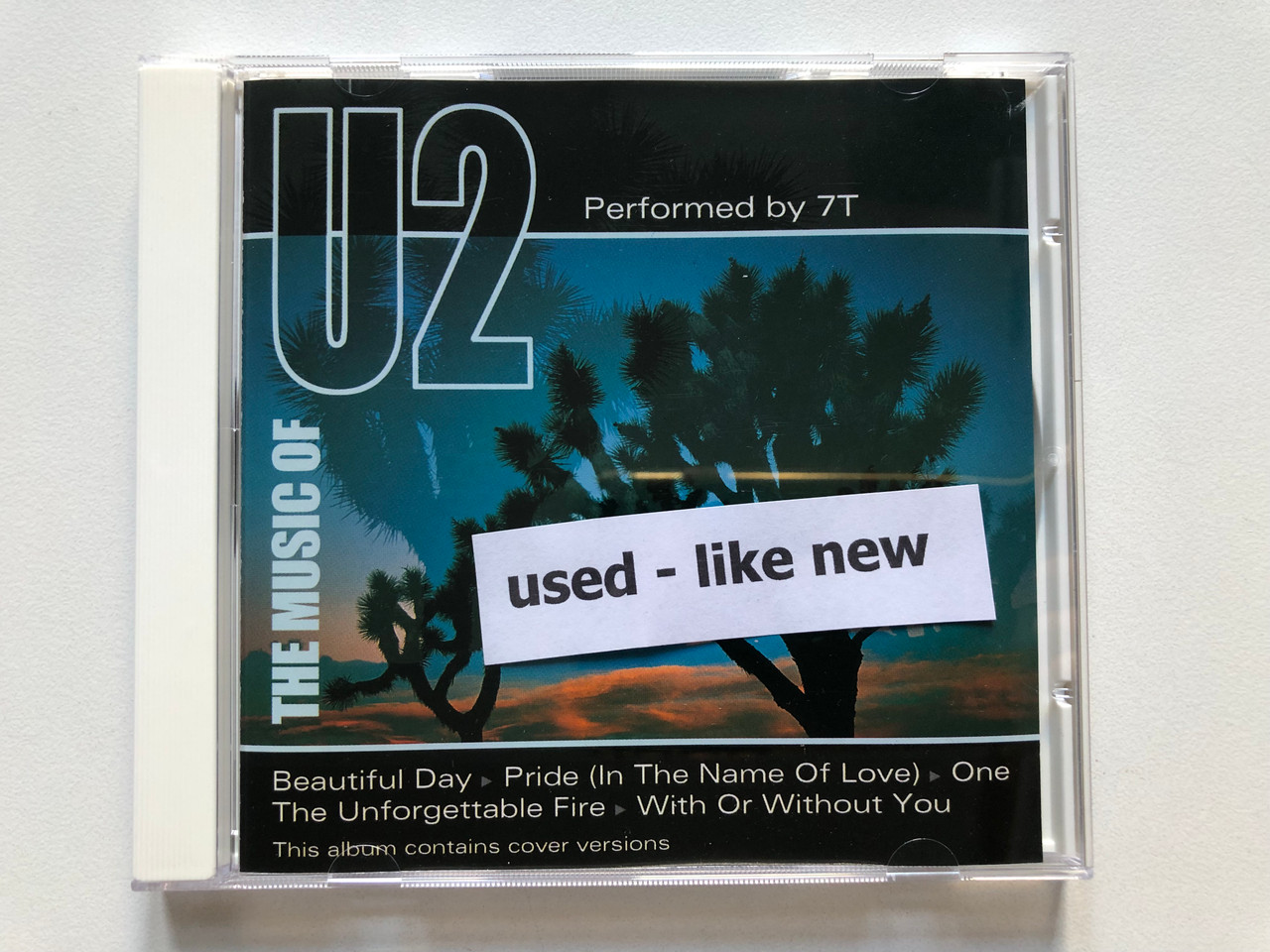 https://cdn10.bigcommerce.com/s-62bdpkt7pb/products/0/images/307513/The_Music_Of_U2_-_Performed_By_7T_Beautiful_Day_Pride_In_The_Name_Of_Love_One_The_Unforgettable_Fire_With_Or_Without_You_This_album_contains_cover_versions_Millennium_Gold_Audio_CD_4__82092.1698730977.1280.1280.JPG?c=2