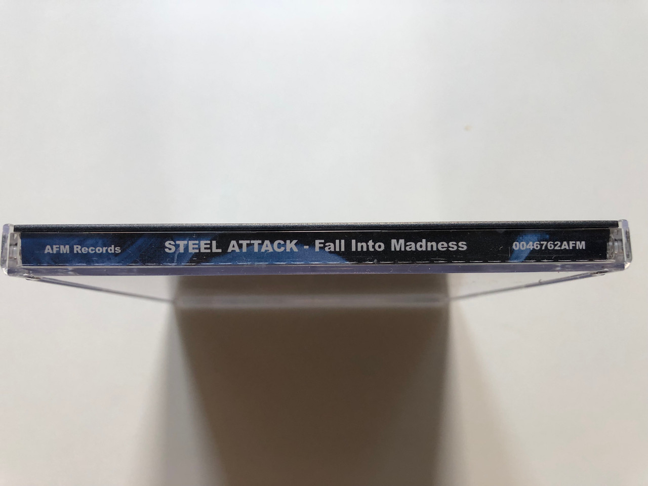 https://cdn10.bigcommerce.com/s-62bdpkt7pb/products/0/images/307531/Steel_Attack_Fall_Into_Madness_AFM_Records_Audio_CD_2001_0046762AFM_3__65869.1698737943.1280.1280.JPG?c=2