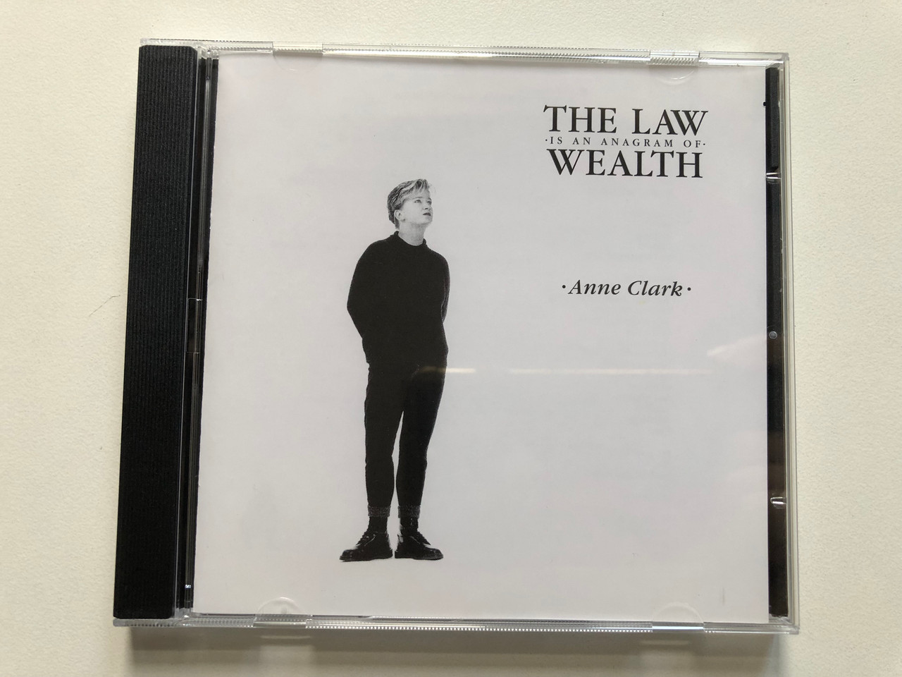 https://cdn10.bigcommerce.com/s-62bdpkt7pb/products/0/images/307659/The_Law_Is_An_Anagram_Of_Wealth_-_Anne_Clark_SPV_Records_Audio_CD_1993_SPV_084-92702_1__90916.1698813640.1280.1280.JPG?c=2