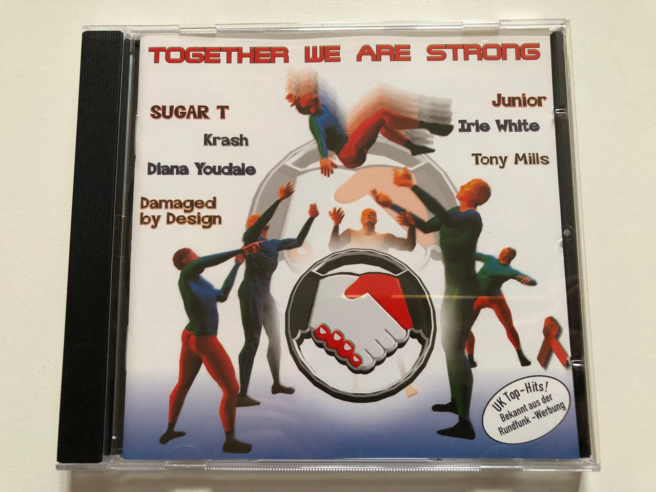 https://cdn10.bigcommerce.com/s-62bdpkt7pb/products/0/images/310544/Together_We_Are_Strong_-_Sugar_T_Krash_Diana_Youdale_Damaged_by_Design_Junior_Irie_White_Tony_Mills_Masonic_Records_Audio_CD_193201-2_1__21105.1699384681.1280.1280.JPG?c=2