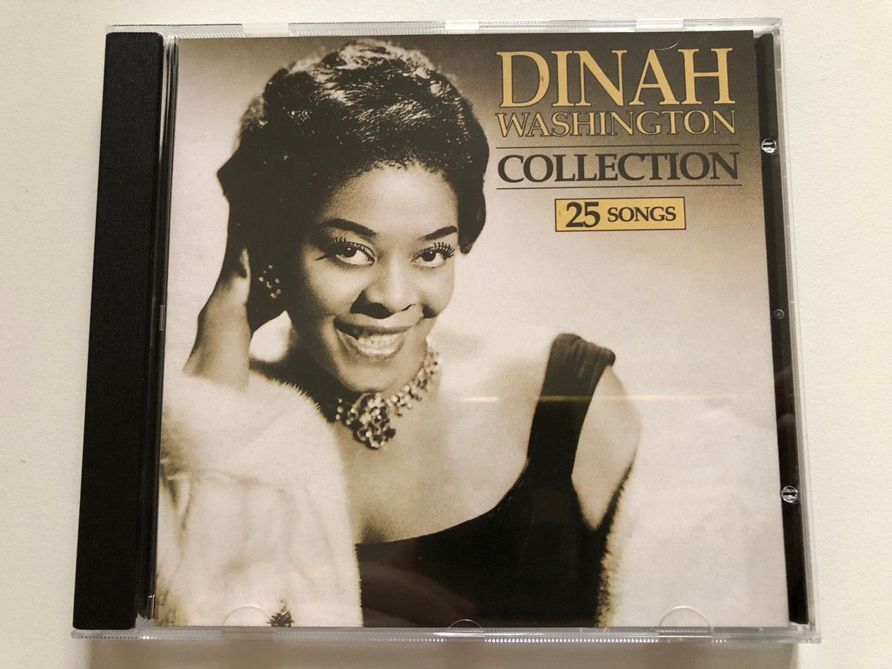 https://cdn10.bigcommerce.com/s-62bdpkt7pb/products/0/images/310587/Dinah_Washington_Collection_25_Songs_The_Collection_Audio_CD_1994_COL057_1__52410.1699391926.1280.1280.JPG?c=2