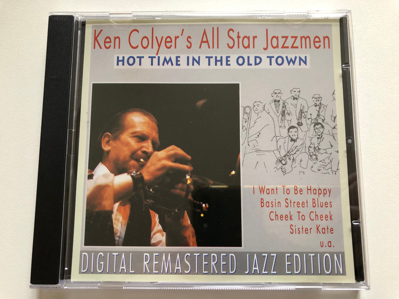 https://cdn10.bigcommerce.com/s-62bdpkt7pb/products/0/images/310798/Ken_Colyers_All_Star_Jazzmen_Hot_Time_In_The_Old_Town_I_Want_To_Be_Happy_Basin_Street_Blues_Cheek_To_Cheek_Sister_Kate_u._a._Pastels_Audio_CD_1995_20_1__25482.1699455153.1280.1280.JPG?c=2