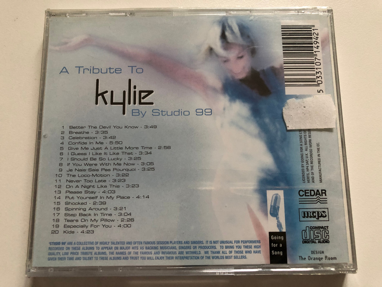 https://cdn10.bigcommerce.com/s-62bdpkt7pb/products/0/images/311405/A_Tribute_To_Kylie_Studio_99_Perform_The_Hits..._-_Spinning_Around_On_A_Night_Like_This_Breathe_Please_Stay_Kids_Shocked_Many_Others_Hits_Going_For_A_Song_Audio_CD_GFS494_2__94203.1699629888.1280.1280.JPG?c=2