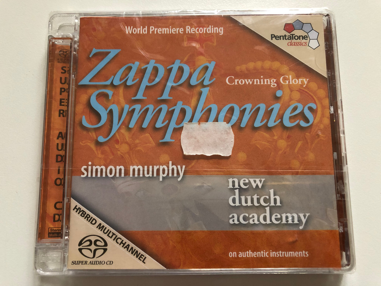 https://cdn10.bigcommerce.com/s-62bdpkt7pb/products/0/images/311960/Zappa_Symphonies_Crowning_Glory_-_Simon_Murphy_New_Dutch_Academy_on_authentic_instruments_World_Premiere_Recording_PentaTone_classics_Audio_CD_2009_PTC_5186_365_1__67205.1699857924.1280.1280.JPG?c=2