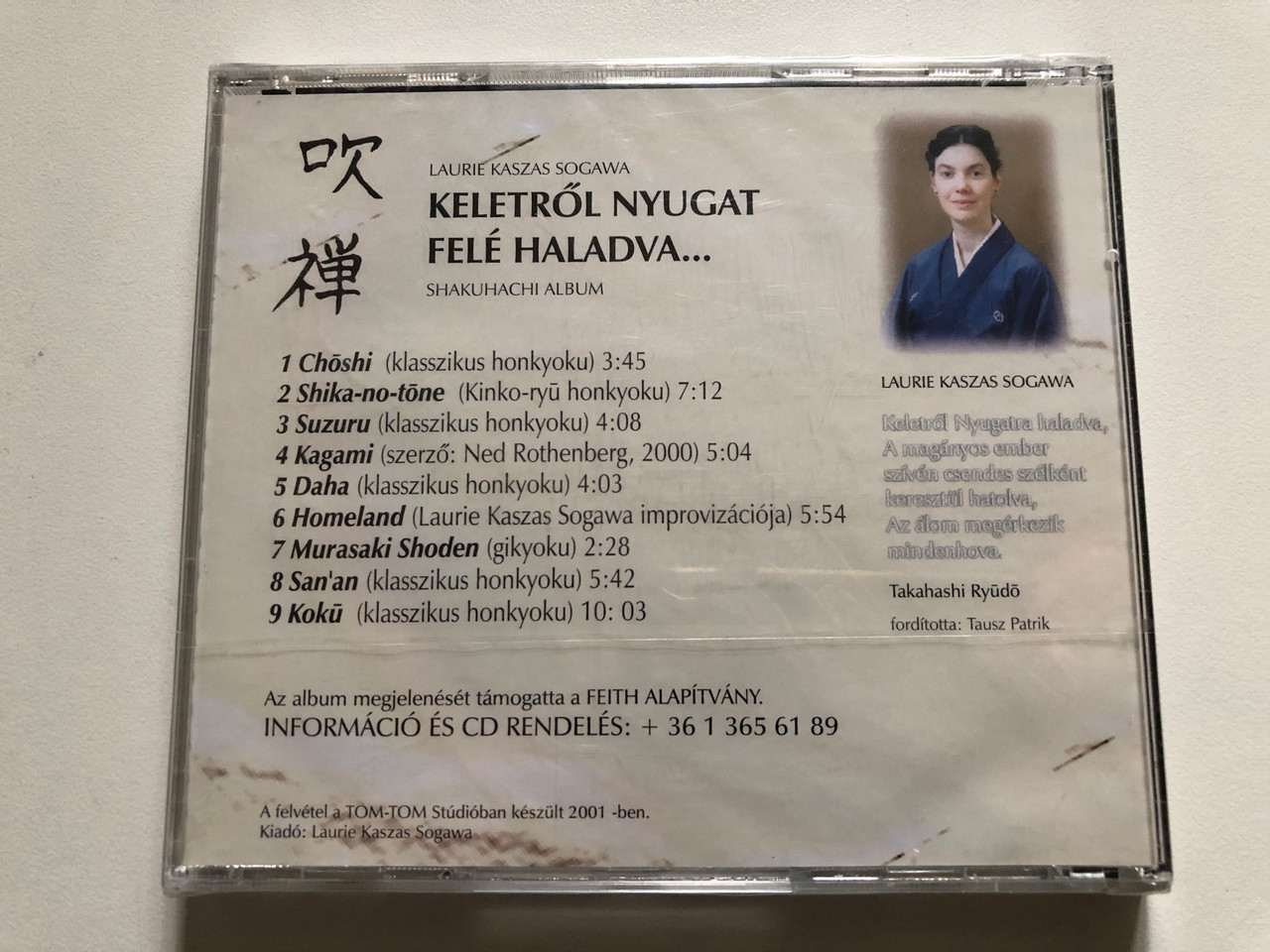 https://cdn10.bigcommerce.com/s-62bdpkt7pb/products/0/images/312274/Laurie_Kaszas_Sogawa_Keletrol_Nyugat_Fele_Haladva..._Shakuhachi_Album_Tom-Tom_Audio_CD_2001_2__18110.1699959304.1280.1280.JPG?c=2