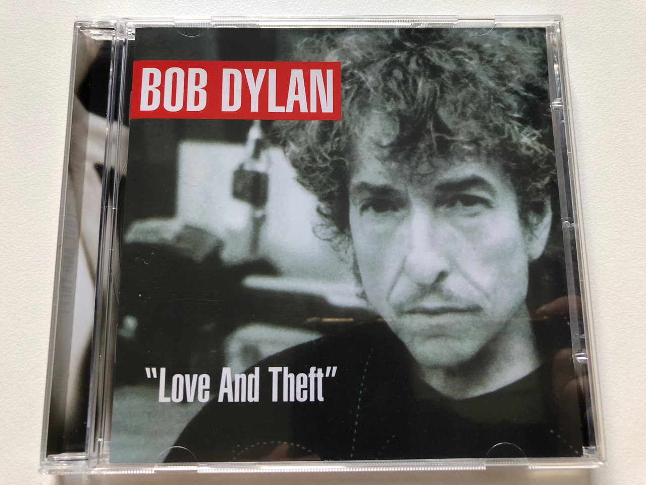 https://cdn10.bigcommerce.com/s-62bdpkt7pb/products/0/images/312318/Bob_Dylan_Love_And_Theft_Columbia_Audio_CD_2001_512357_2_1__96149.1699973783.1280.1280.JPG?c=2