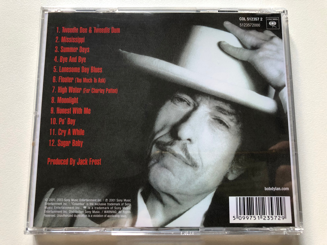 https://cdn10.bigcommerce.com/s-62bdpkt7pb/products/0/images/312319/Bob_Dylan_Love_And_Theft_Columbia_Audio_CD_2001_512357_2_2__88499.1699973792.1280.1280.JPG?c=2