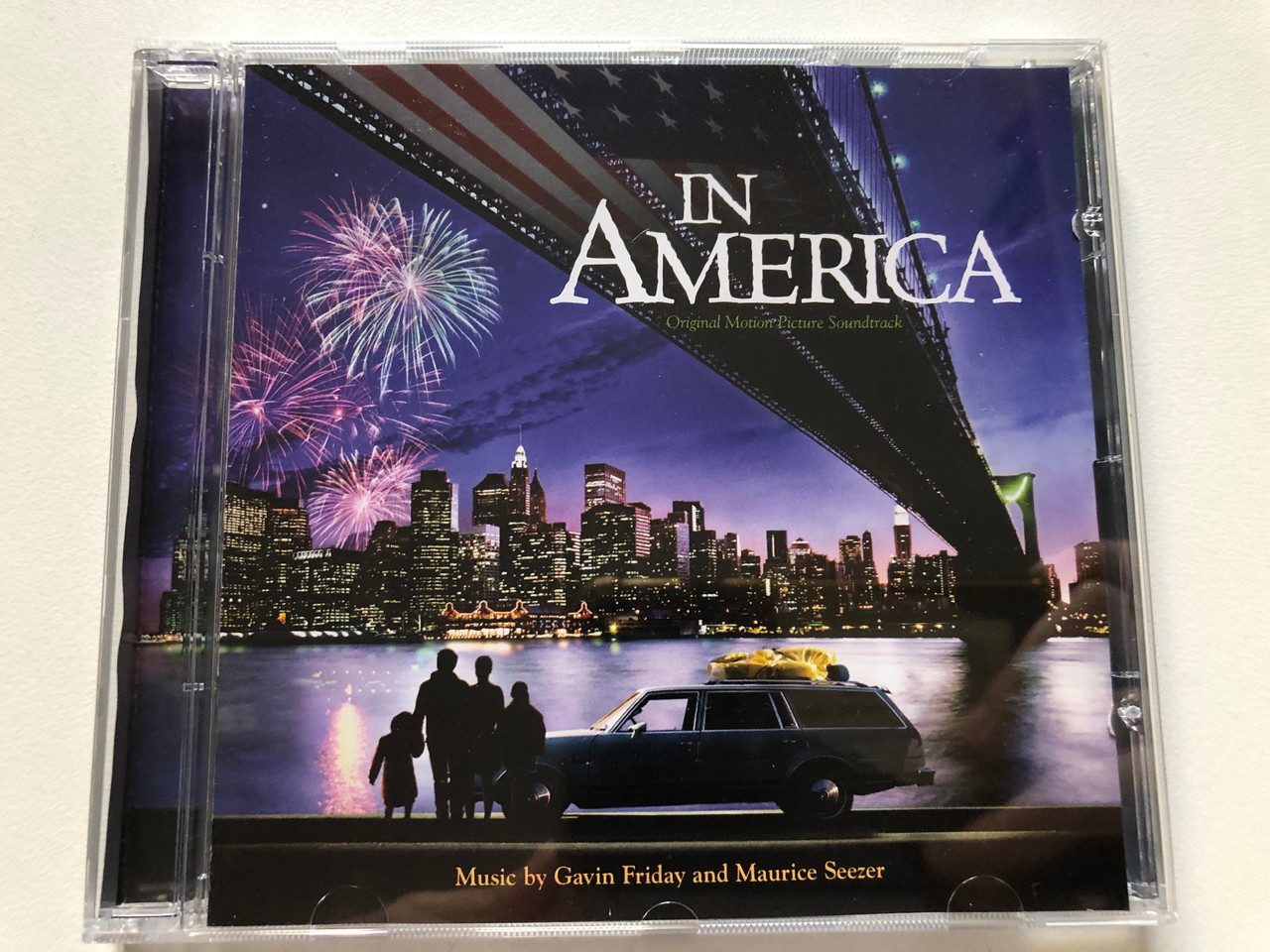 https://cdn10.bigcommerce.com/s-62bdpkt7pb/products/0/images/312774/In_America_Original_Motion_Picture_Soundtrack_-_Music_by_Gavin_Friday_and_Maurice_Seezer_Atlantic_Audio_CD_2003_7567-83706-2_1__21823.1700144089.1280.1280.JPG?c=2