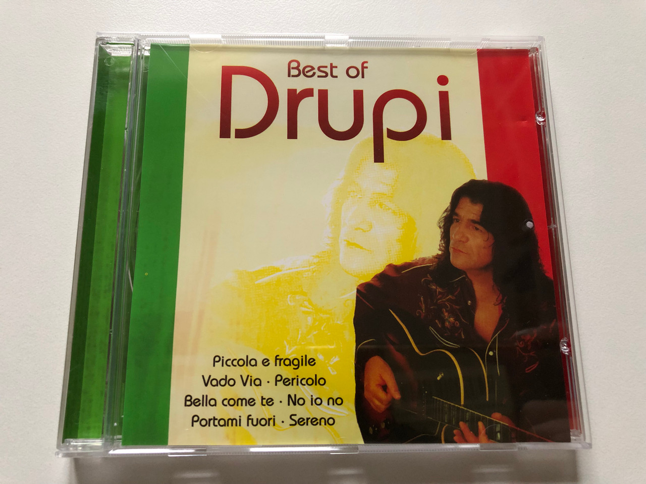 https://cdn10.bigcommerce.com/s-62bdpkt7pb/products/0/images/312819/Best_Of_Drupi_-_Piccola_e_fragile_Voda_Via_Pericolo_Bella_come_te_No_io_no_Portami_fuori_Sereno_Eurotrend_Audio_CD_CD_142_1__75808.1700152998.1280.1280.JPG?c=2