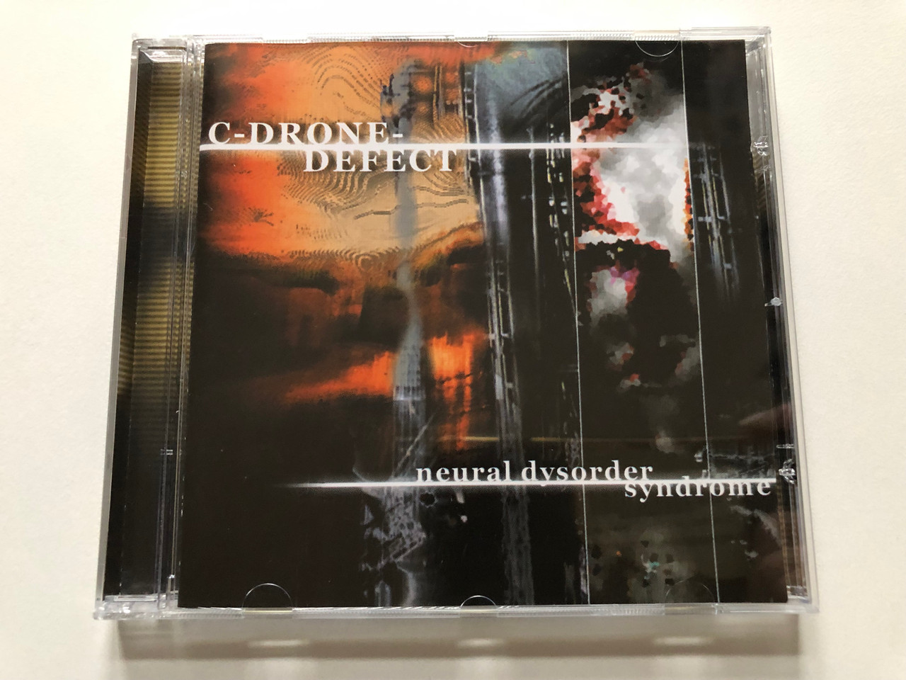 https://cdn10.bigcommerce.com/s-62bdpkt7pb/products/0/images/312842/C-Drone-Defect_Neural_Dysorder_Syndrome_Synthetic_Symphony_Audio_CD_2001_SPV_085-62502_CD_1__21896.1700200654.1280.1280.JPG?c=2
