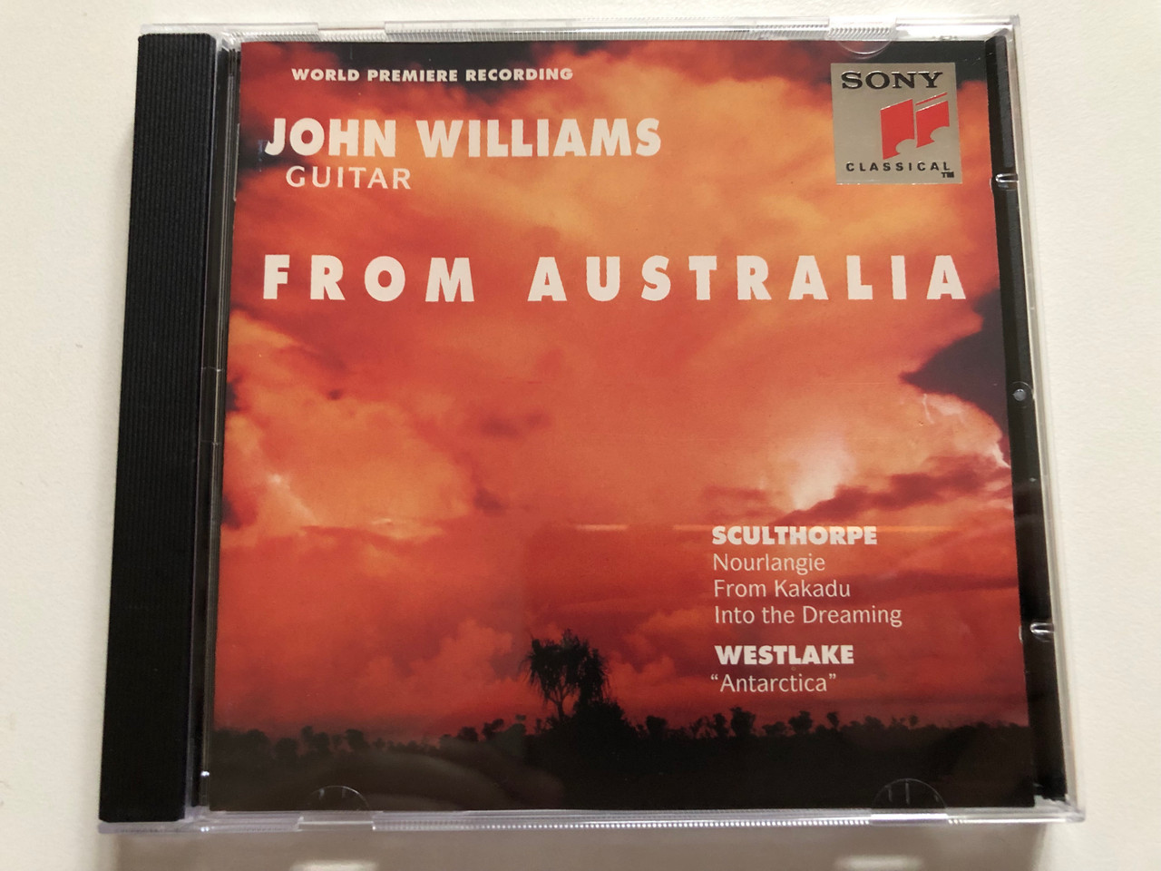 https://cdn10.bigcommerce.com/s-62bdpkt7pb/products/0/images/313061/John_Williams_guitar_From_Australia_-_Sculthorpe_Nourlangie_From_Kakadu_Into_the_Dreaming_Westlake_Antarctica_Sony_Classical_Audio_CD_1994_SK_53_361_1__82777.1700481420.1280.1280.JPG?c=2