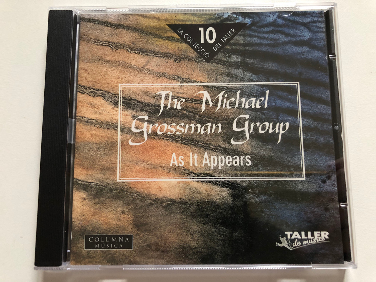 https://cdn10.bigcommerce.com/s-62bdpkt7pb/products/0/images/313089/The_Michael_Grossman_Group_As_It_Appears_Taller_De_Msics_Audio_CD_1CM_0012_1__66500.1700489384.1280.1280.JPG?c=2