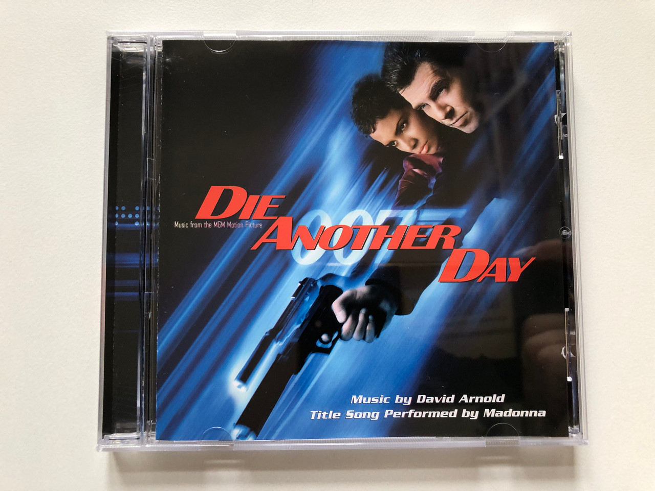 https://cdn10.bigcommerce.com/s-62bdpkt7pb/products/0/images/313345/Die_Another_Day_Music_From_The_MGM_Motion_Picture_-_Music_By_David_Arnold_Title_Song_Performed_By_Madonna_Warner_Bros._Records_Audio_CD_2002_9362-48348-2_1__03677.1700744286.1280.1280.JPG?c=2