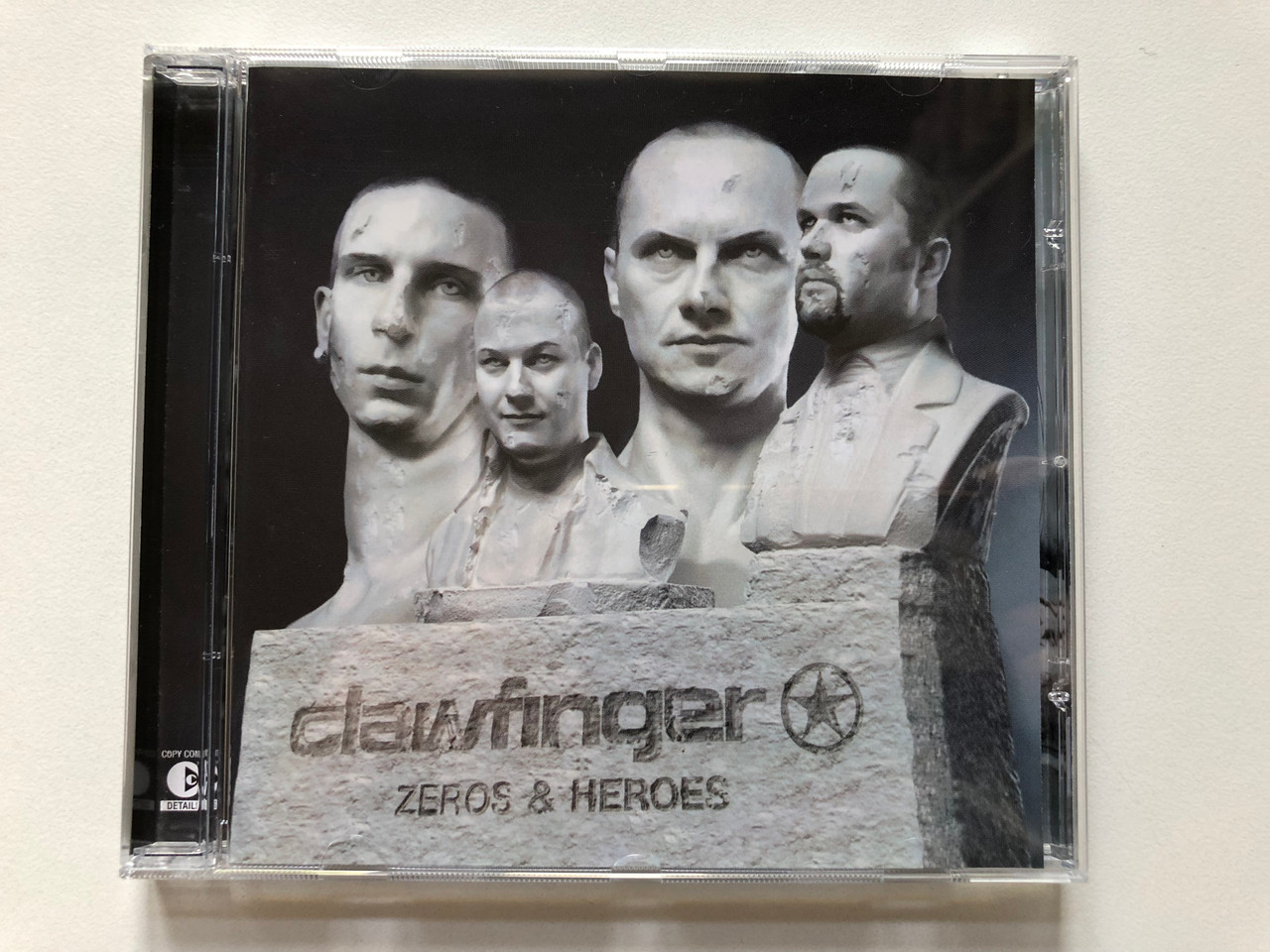 https://cdn10.bigcommerce.com/s-62bdpkt7pb/products/0/images/313379/Clawfinger_Zeros_Heroes_Supersonic_Records_Audio_CD_2003_SUPERSONIC_132_1__71166.1700750160.1280.1280.JPG?c=2