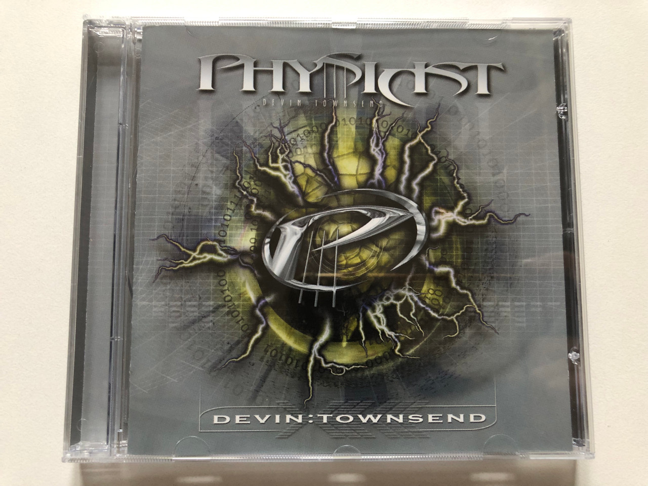 https://cdn10.bigcommerce.com/s-62bdpkt7pb/products/0/images/313450/DevinTownsend_Physicist_Inside_Out_Music_Audio_CD_2000_IOMCD_069_1__30451.1700837134.1280.1280.JPG?c=2