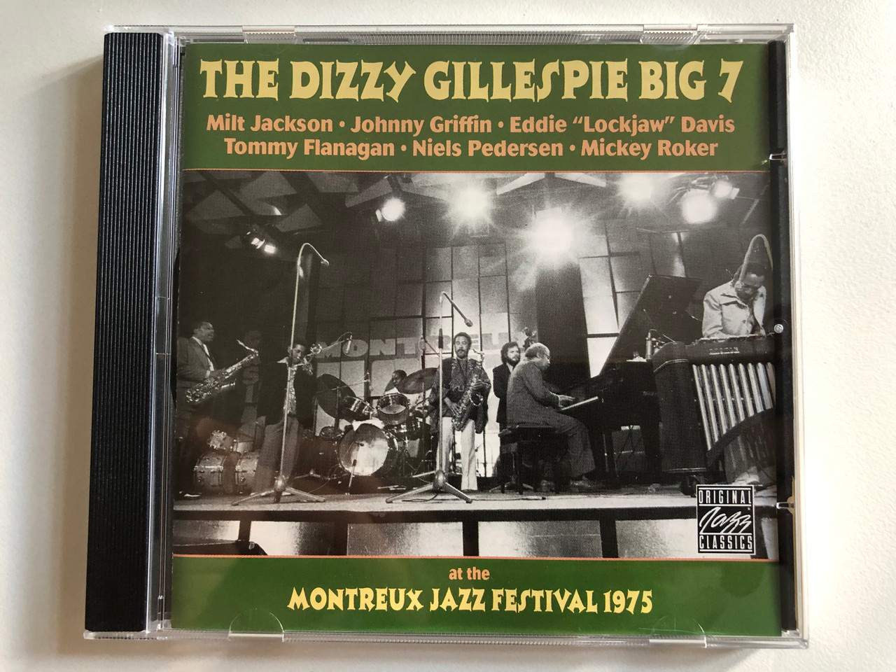https://cdn10.bigcommerce.com/s-62bdpkt7pb/products/0/images/313477/The_Dizzy_Gillespie_Big_7_At_The_Montreux_Jazz_Festival_1975_-_Milt_Jackson_Johnny_Griffin_Eddie_Lockjaw_Davis_Tommy_Flanagan_Niels-Henning_Mickey_Roker_Original_Jazz_Classics_Audio_C_1__52009.1700842204.1280.1280.JPG?c=2