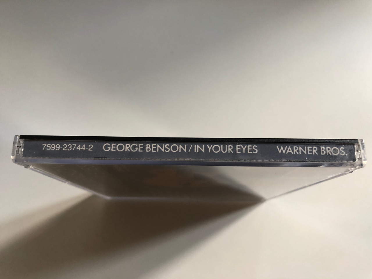 https://cdn10.bigcommerce.com/s-62bdpkt7pb/products/0/images/313486/George_Benson_In_Your_Eyes_Warner_Bros._Records_Audio_CD_7599-23744-2_3__01001.1700844358.1280.1280.JPG?c=2