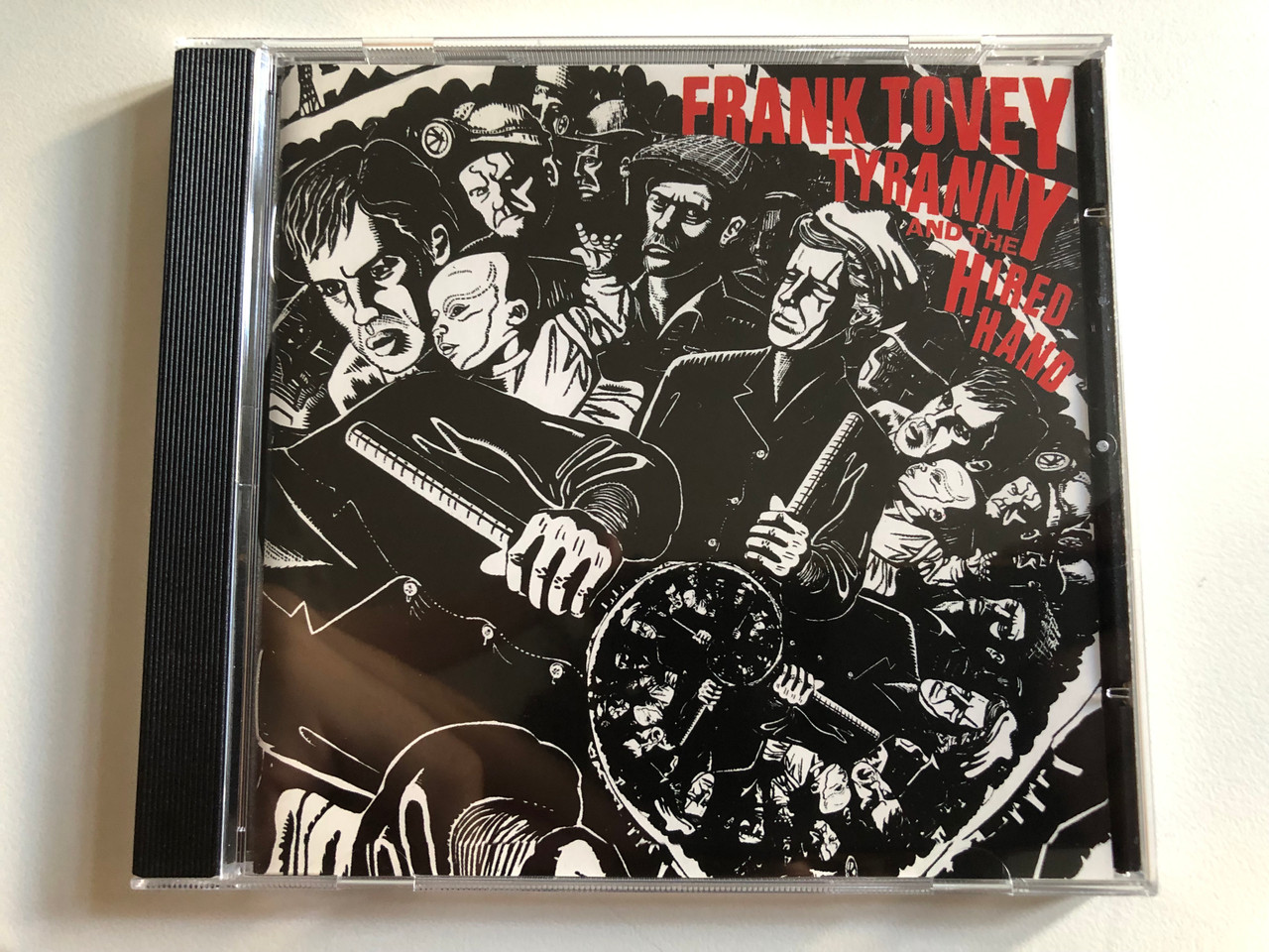 https://cdn10.bigcommerce.com/s-62bdpkt7pb/products/0/images/313835/Frank_Tovey_Tyranny_And_The_Hired_Hand_Mute_Audio_CD_1989_CD_STUMM_73_1__18706.1701069605.1280.1280.JPG?c=2