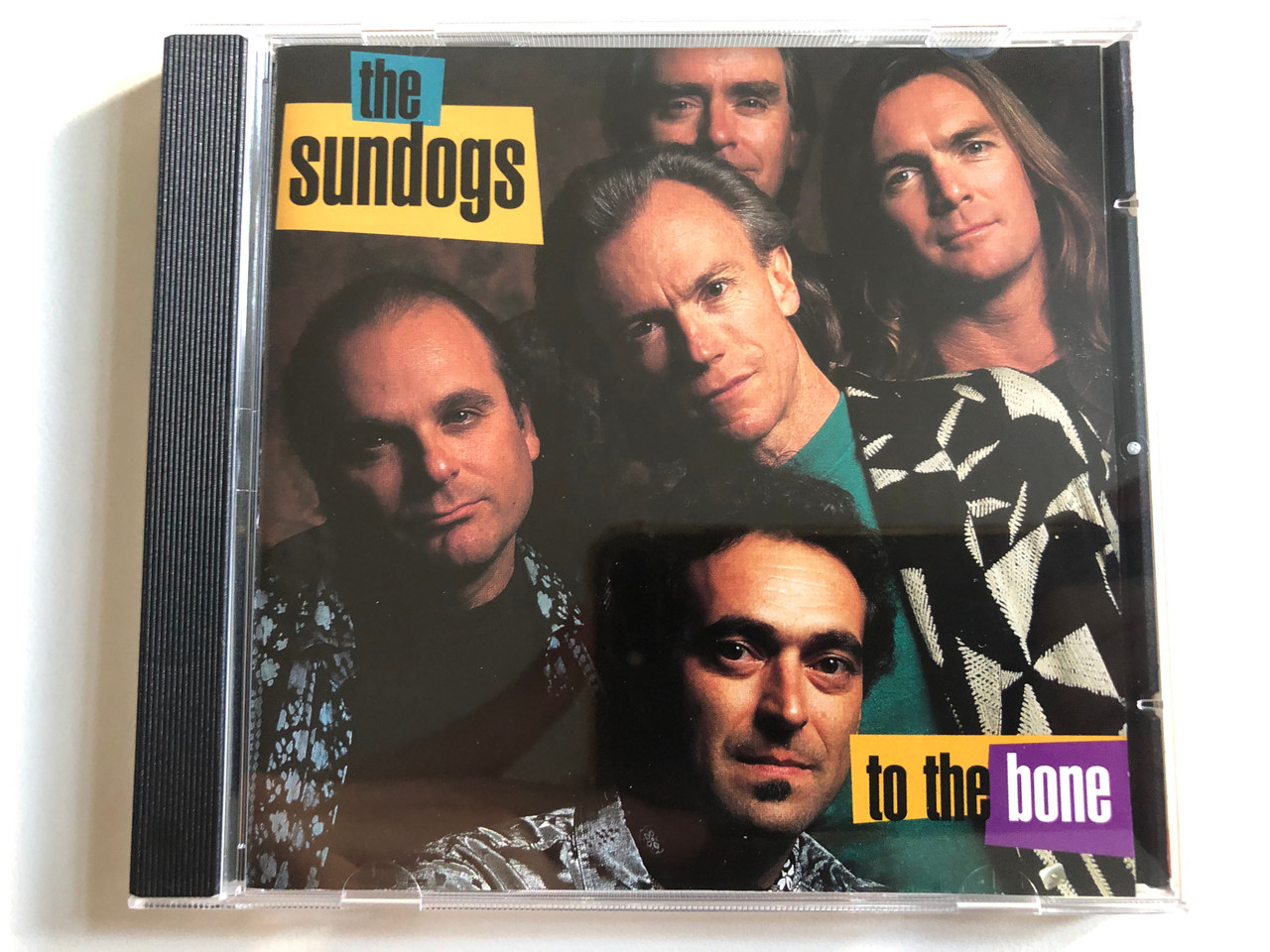 https://cdn10.bigcommerce.com/s-62bdpkt7pb/products/0/images/313859/The_Sundogs_To_The_Bone_Rounder_Records_Audio_CD_1994_CD_9044_1__59675.1701091547.1280.1280.JPG?c=2