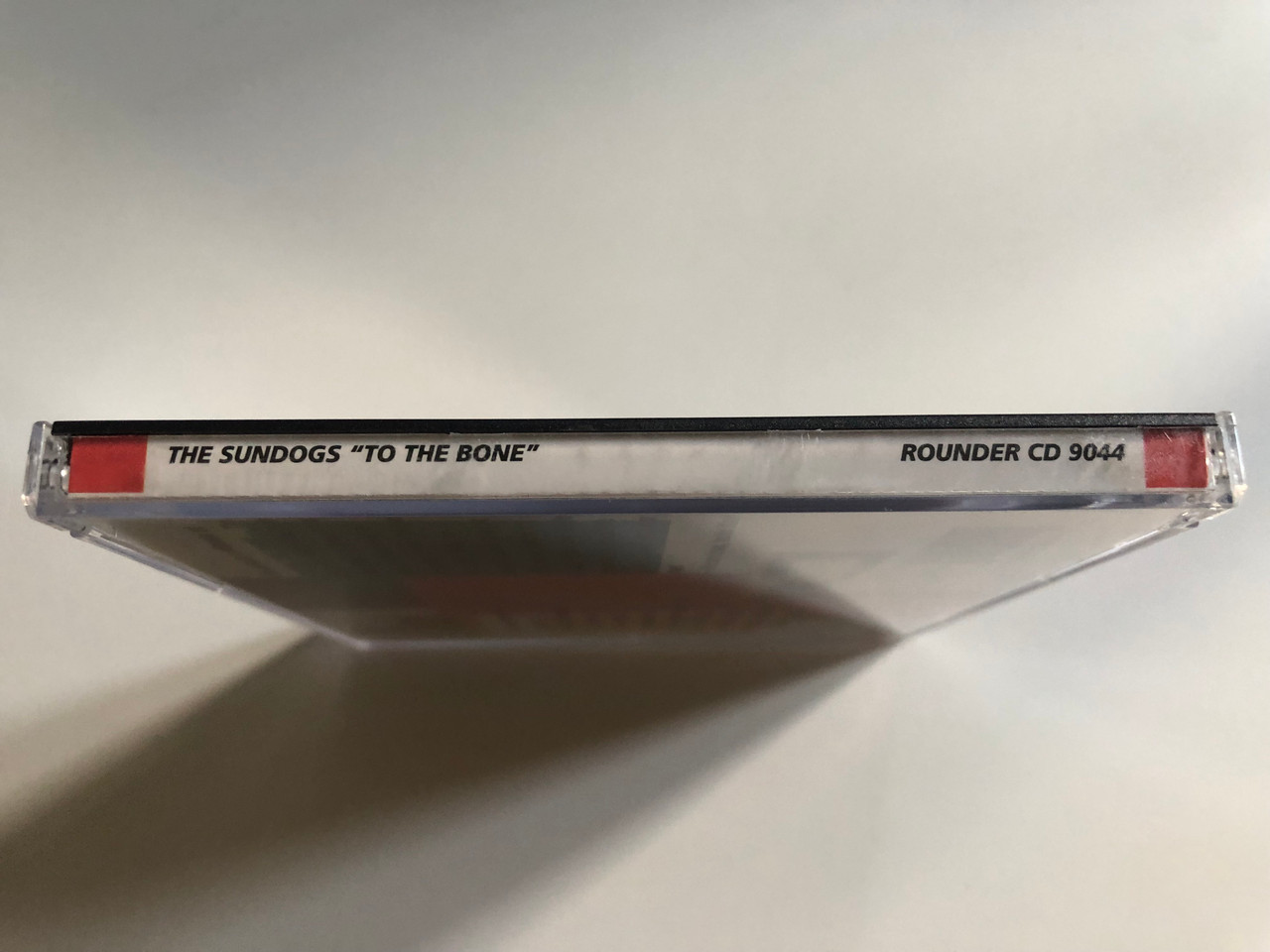 https://cdn10.bigcommerce.com/s-62bdpkt7pb/products/0/images/313861/The_Sundogs_To_The_Bone_Rounder_Records_Audio_CD_1994_CD_9044_3__26457.1701091566.1280.1280.JPG?c=2