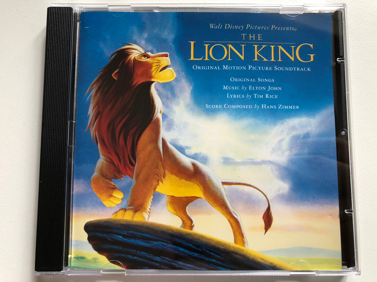 https://cdn10.bigcommerce.com/s-62bdpkt7pb/products/0/images/313996/The_Lion_King_Original_Motion_Picture_Soundtrack_-_Original_Songs_Music_By_Elton_John_Lyrics_by_Tim_Rice_Score_Composed_by_Hans_Zimmer_Walt_Disney_Records_Audio_CD_1994_74321214222_1__92330.1701245315.1280.1280.JPG?c=2