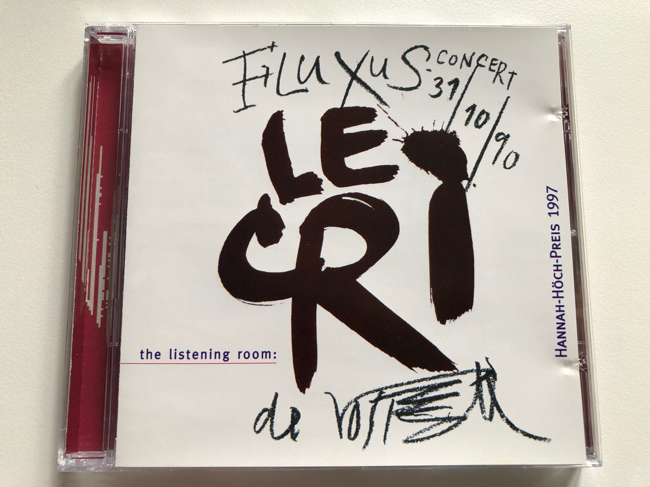 https://cdn10.bigcommerce.com/s-62bdpkt7pb/products/0/images/314180/Wolf_Vostell_Fluxus-Concert_LE_CRI_311090_Hannah-Hoch-Preis_1997_the_listening_room_Audio_CD_1997_edel_0014552TLR_1__21061.1701332006.1280.1280.JPG?c=2