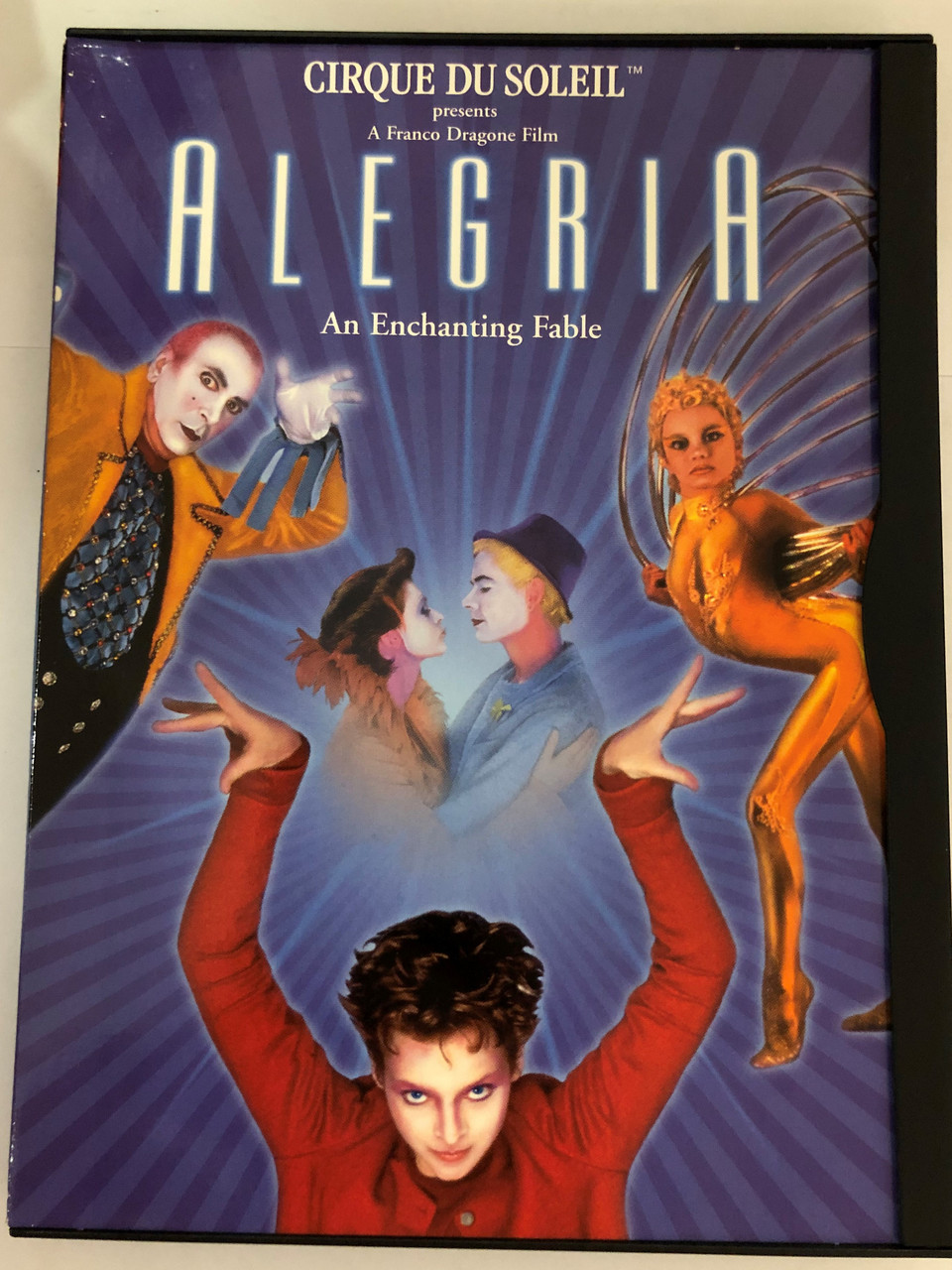 Cirque du Soleil presents - Alegria - An enchanting Fable DVD 1998 /  Directed by y Franco Dragone / Starring: Frank Langella, Mako, Julie Cox,  René Bazinet, Whoopi Goldberg - Bible in My Language