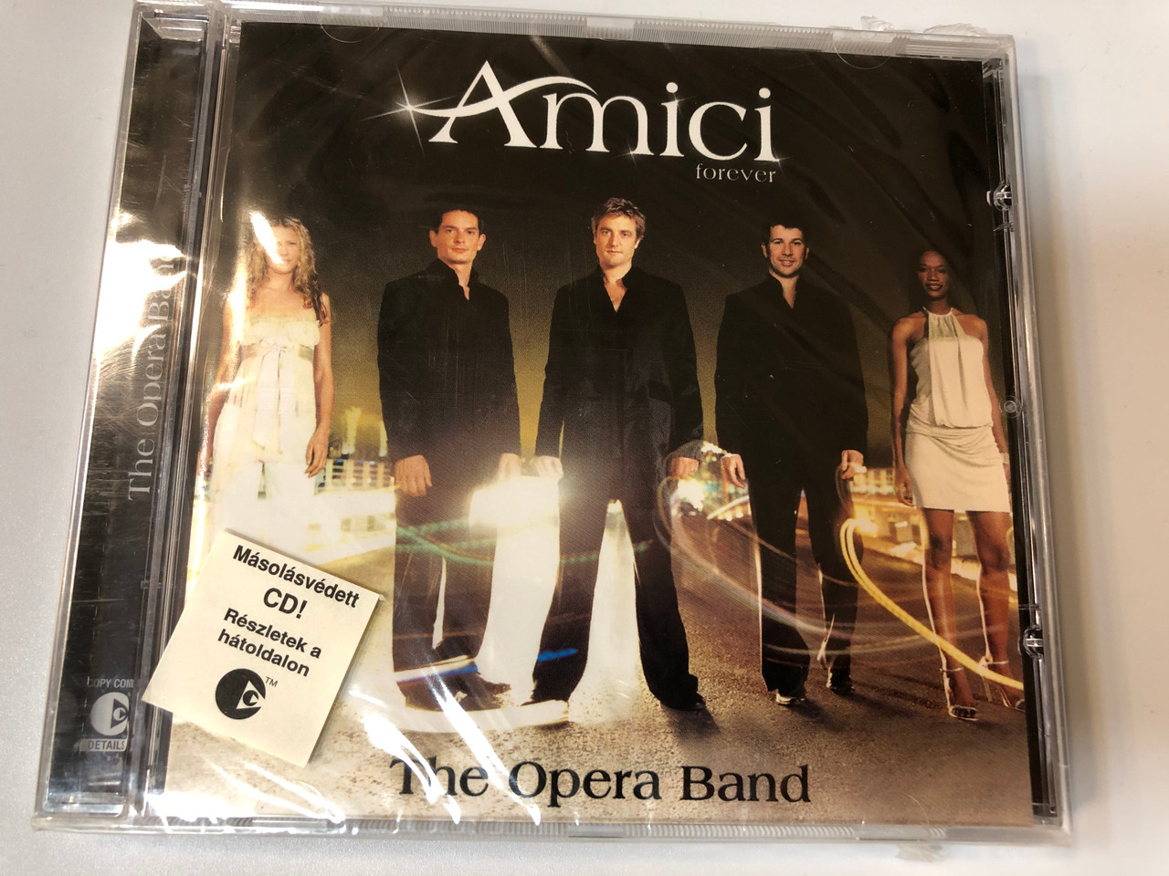 https://cdn10.bigcommerce.com/s-62bdpkt7pb/products/27644/images/166058/Amici_Forever_The_Opera_Band_RCA_Victor_Audio_CD_2003_82876_60443_2_1__31432.1611745447.1280.1280.JPG?c=2&_gl=1*1w9v0b6*_ga*MjAyOTE0ODY1OS4xNTkyNDY2ODc5*_ga_WS2VZYPC6G*MTY5NDM1NzY2NS4zNzYzLjEuMTY5NDM2MDIxOS42MC4wLjA.