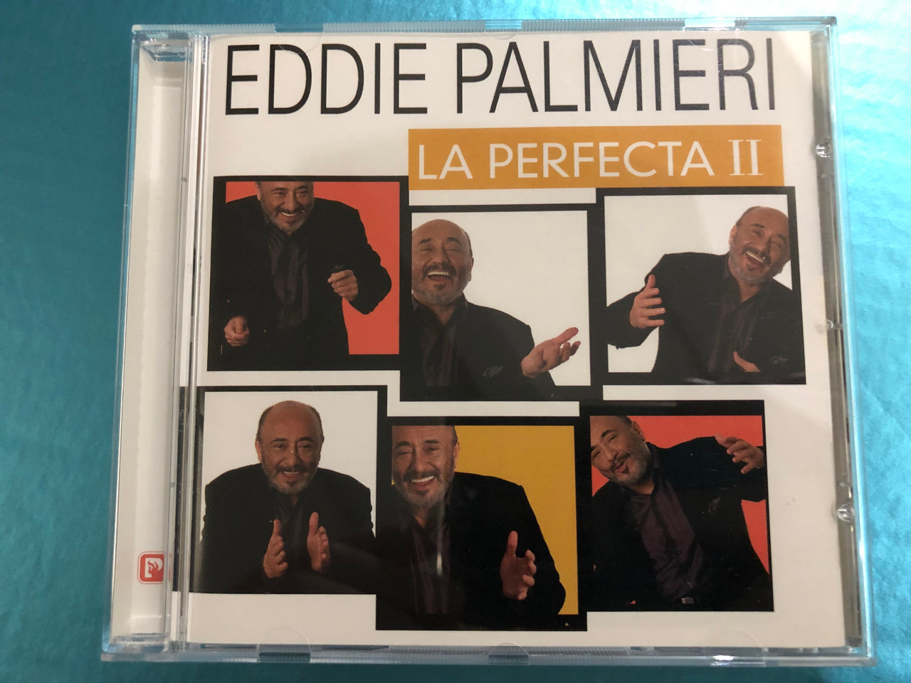 https://cdn10.bigcommerce.com/s-62bdpkt7pb/products/28038/images/167959/Eddie_Palmieri_La_Perfecta_II_Concord_Picante_Audio_CD_2002_CCD-2136-2_1__74340.1613130858.1280.1280.JPG?c=2&_ga=2.117323394.543434869.1618406858-6505287.1618406858