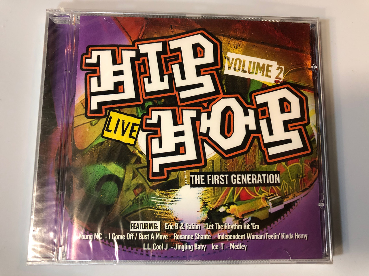 https://cdn10.bigcommerce.com/s-62bdpkt7pb/products/28113/images/168355/Hip_Hop_-_The_First_Generation_-_Volume_2_-_Live_Featuring_Eric_B._Rakim_Let_The_Rhythm_Hit_em_Young_MC_I_Come_OffBust_A_Move_Roxanne_Shante_Independent_WomanFeelin_Kinda_Horny_A_1__27948.1613475536.1280.1280.JPG?c=2&_ga=2.83312530.543434869.1618406858-6505287.1618406858