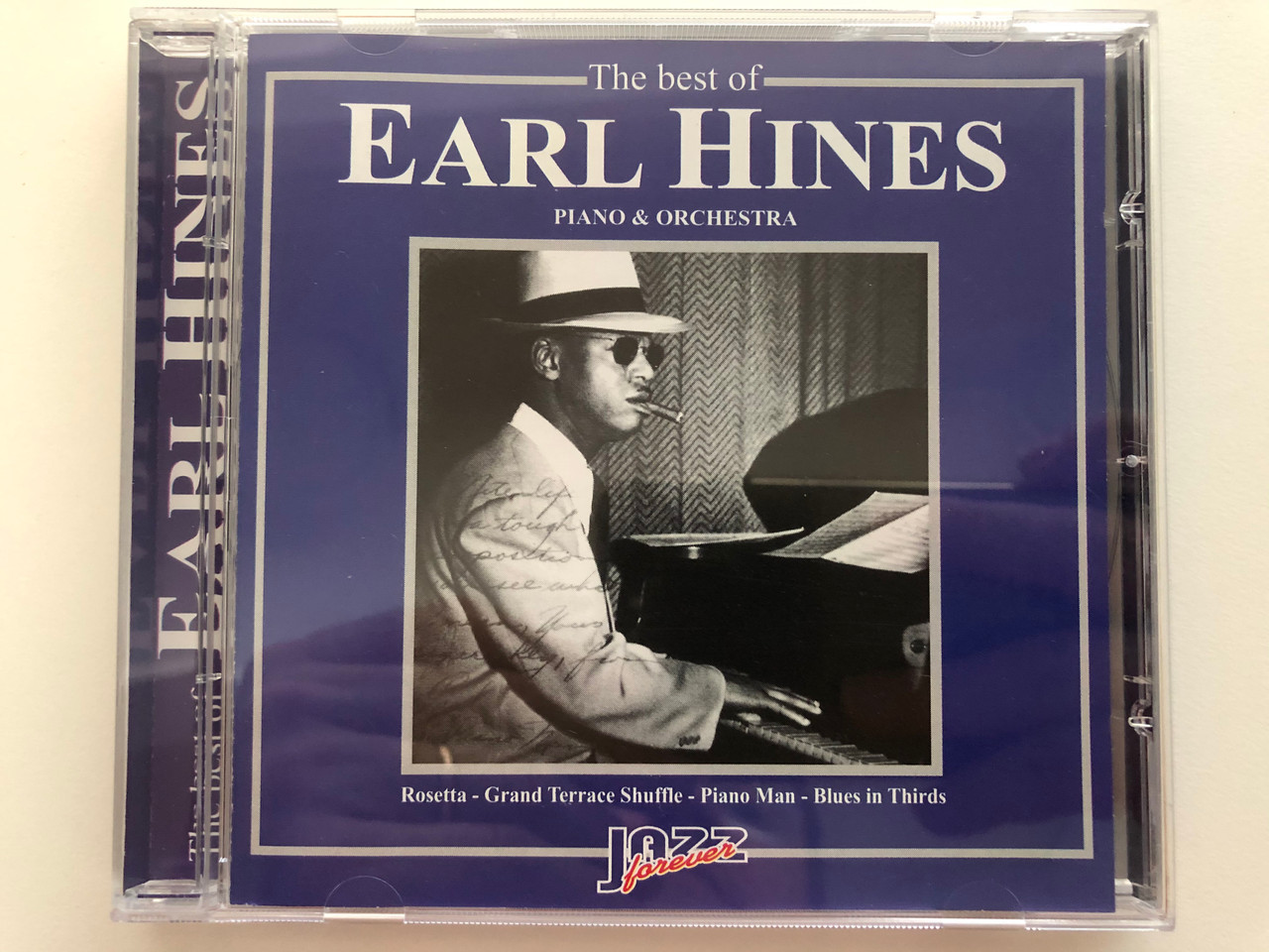 https://cdn10.bigcommerce.com/s-62bdpkt7pb/products/28774/images/171650/The_Best_Of_Earl_Hines_-_Piano_Orchestra_Rosetta_Grand_Terrace_Shuffle_Piano_Man_Blues_in_Thirds_Jazz_Forever_Audio_CD_2000_CD_67023_1__32023.1616000310.1280.1280.JPG?c=2&_ga=2.203924816.154268922.1617891306-1247300196.1617891306